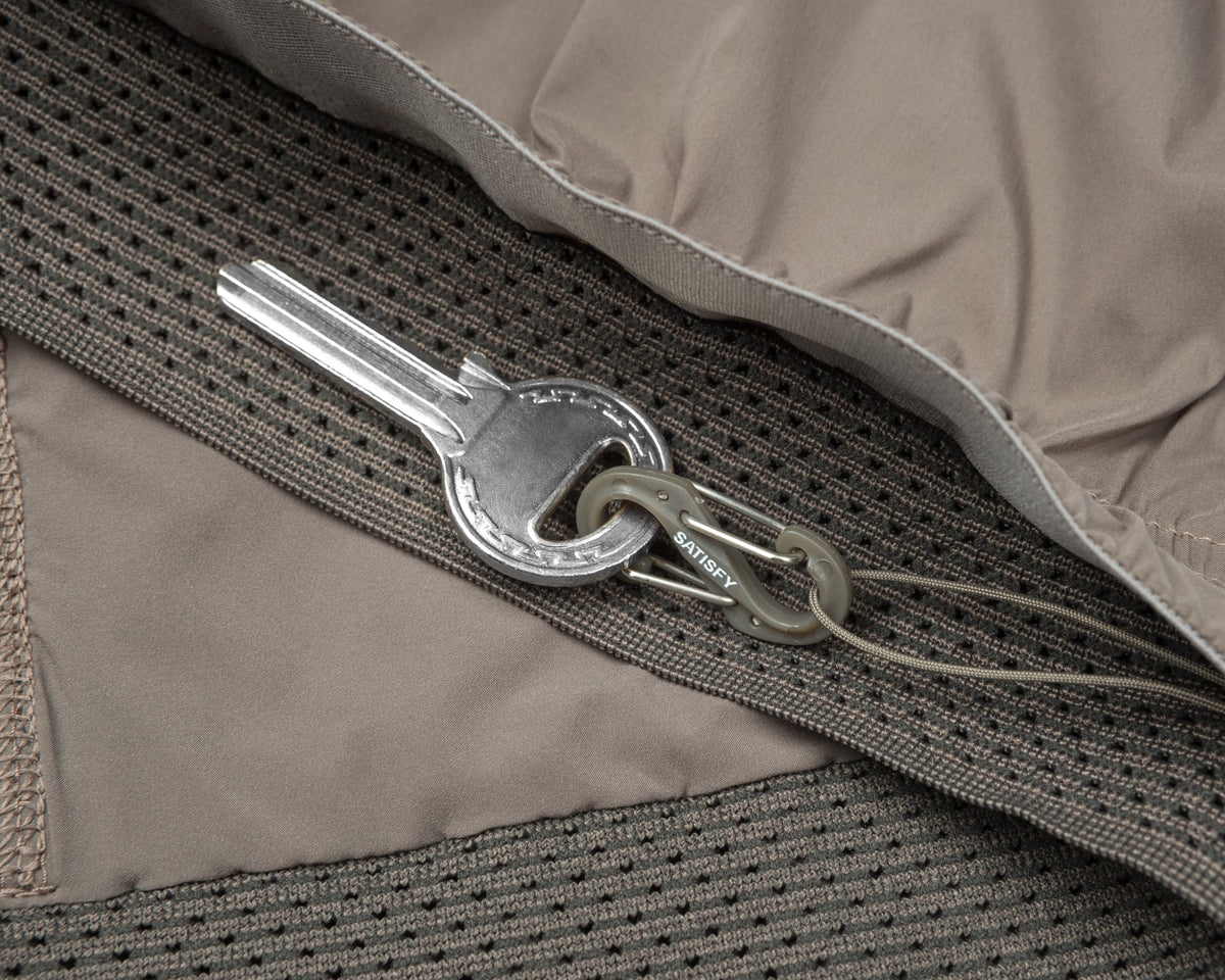 Satisfy TechSilk 8" Shorts carabiner detail
