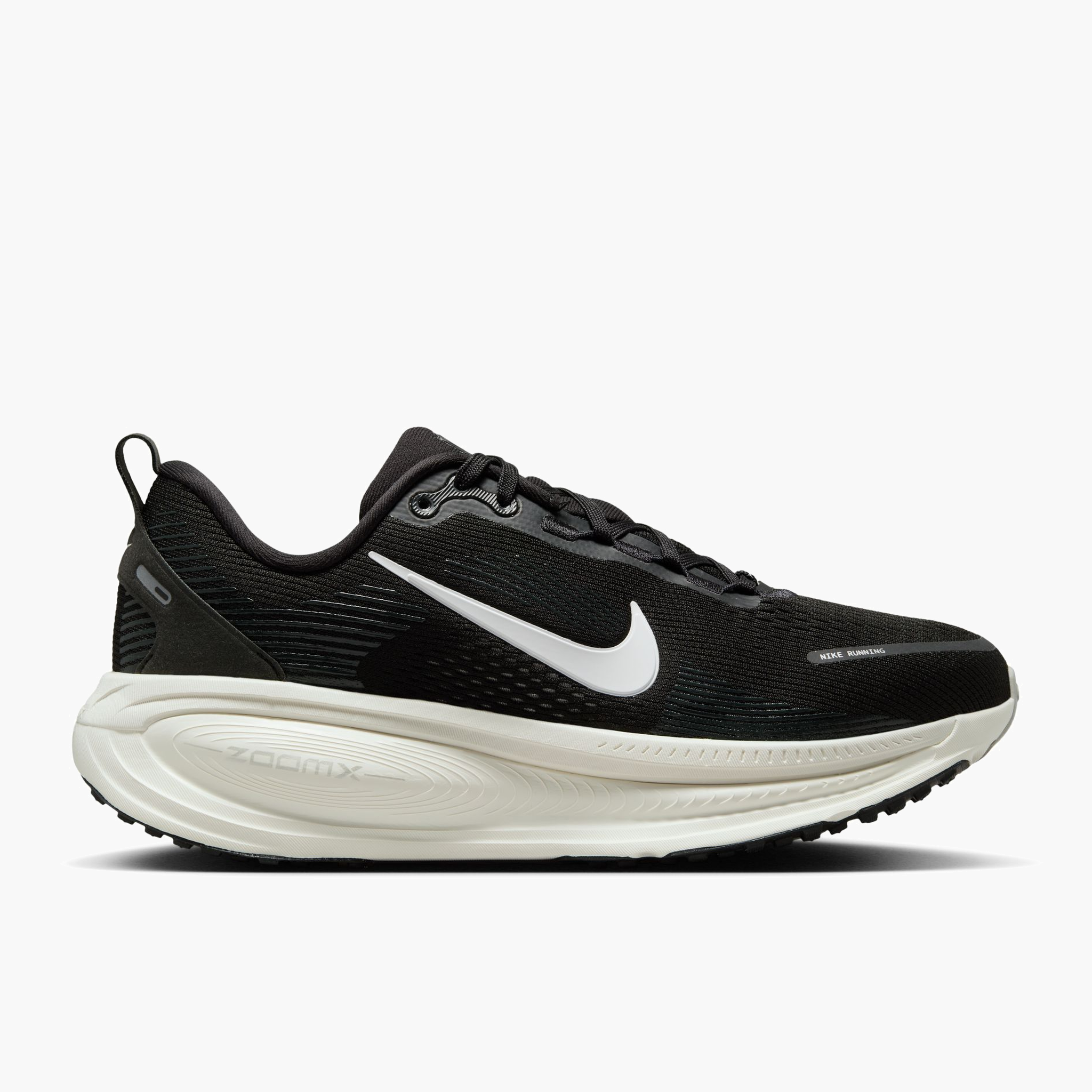 Lateral angle shot of Women's Vomero 18 in Black / Summit White-Coconut Milk