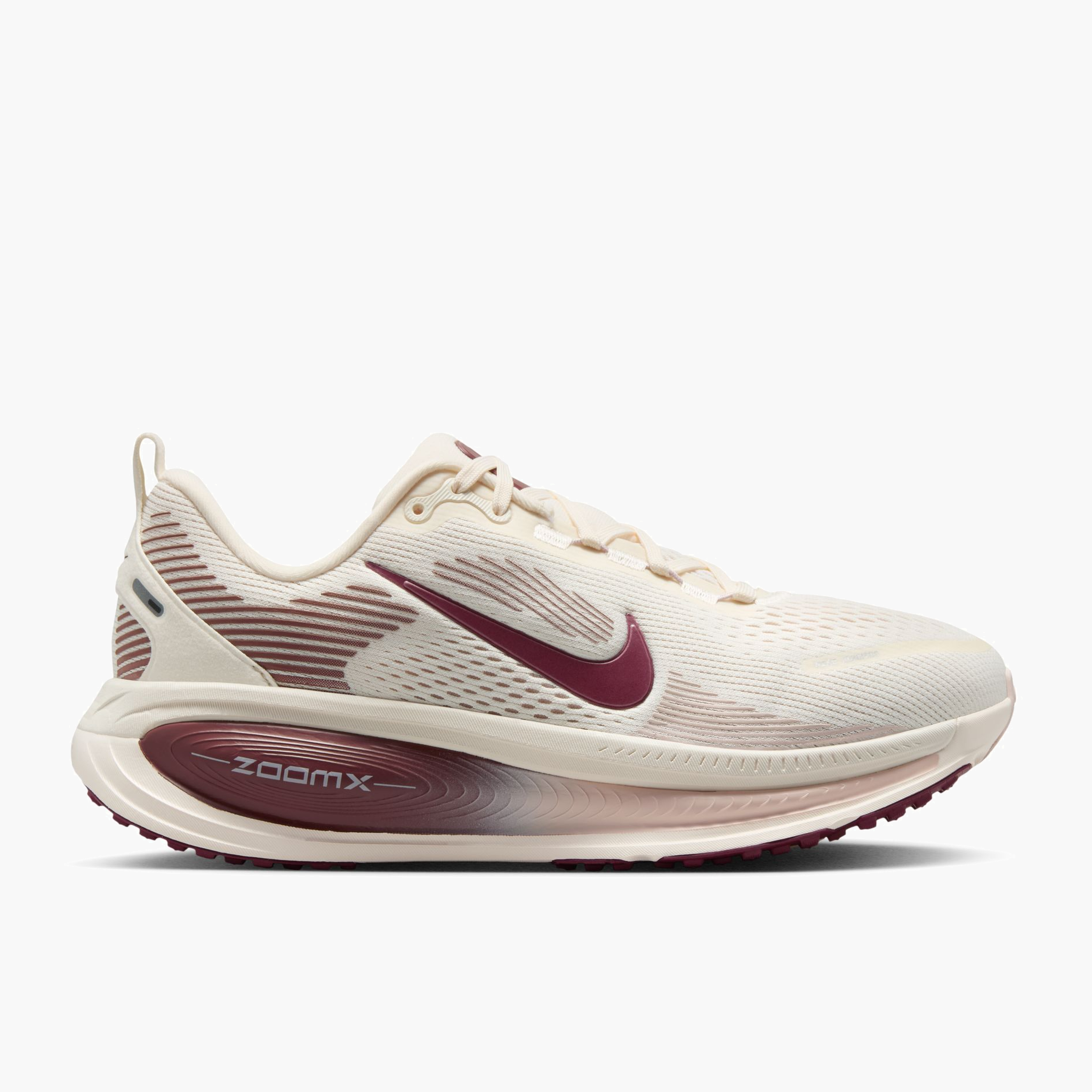 Lateral angle shot of Women's Vomero 18 in Pale Ivory / Dark Team Red-Red Sepia