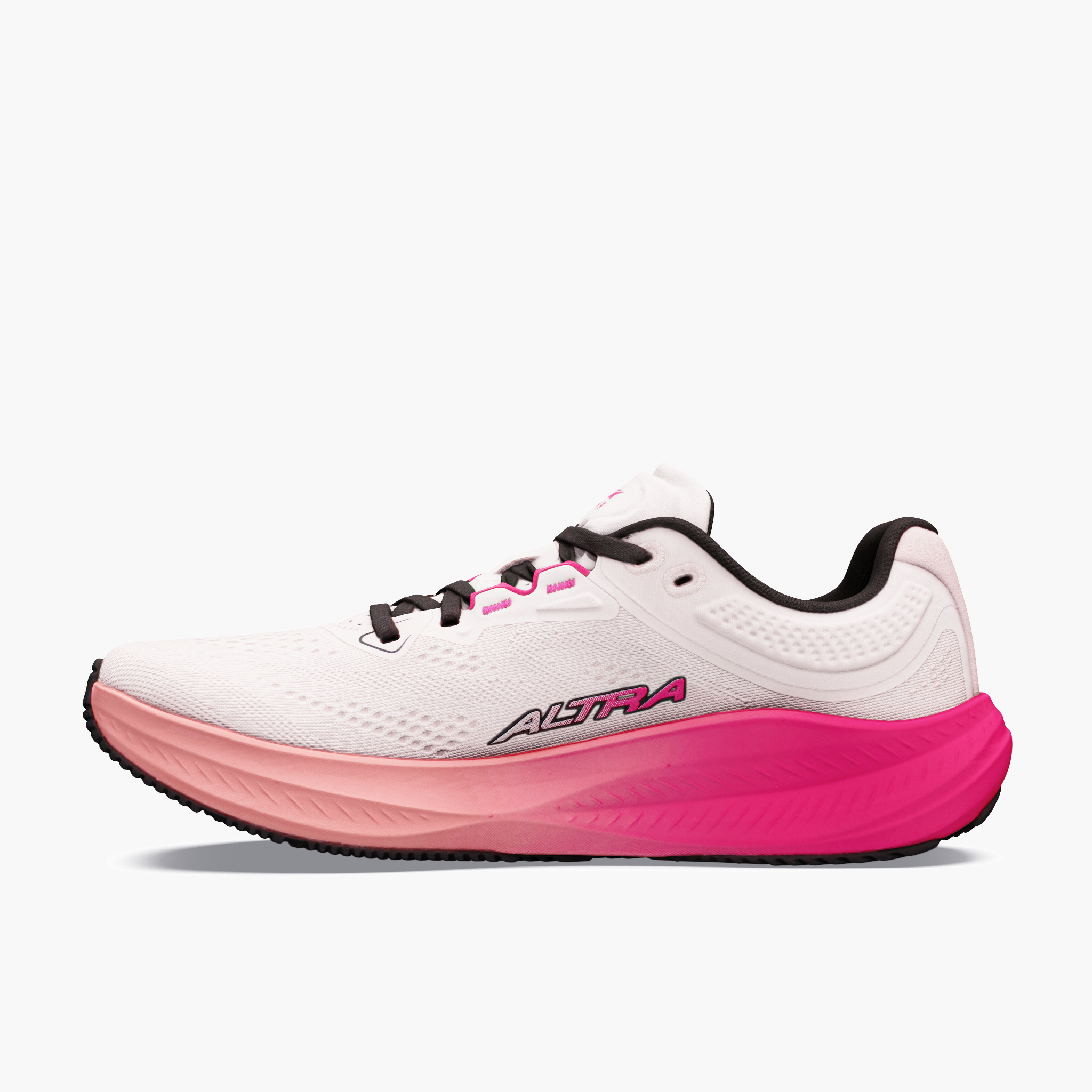 Medial angle shot of Women's Torin 9 in Coconut Cream / Pink Glow