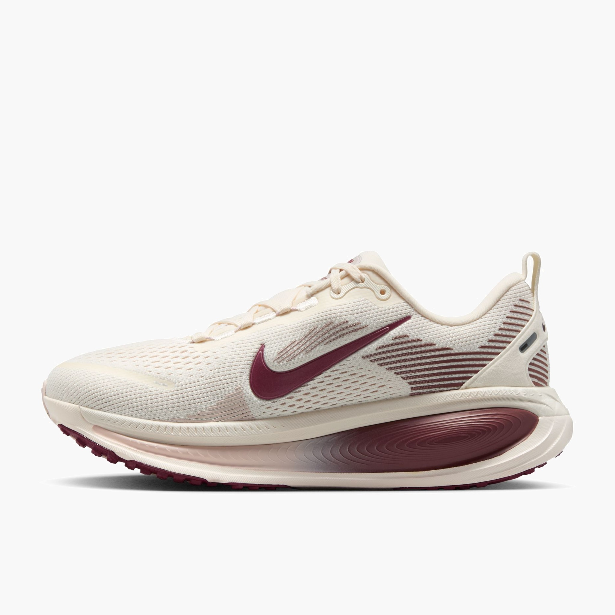 Medial angle shot of Women's Vomero 18 in Pale Ivory / Dark Team Red-Red Sepia