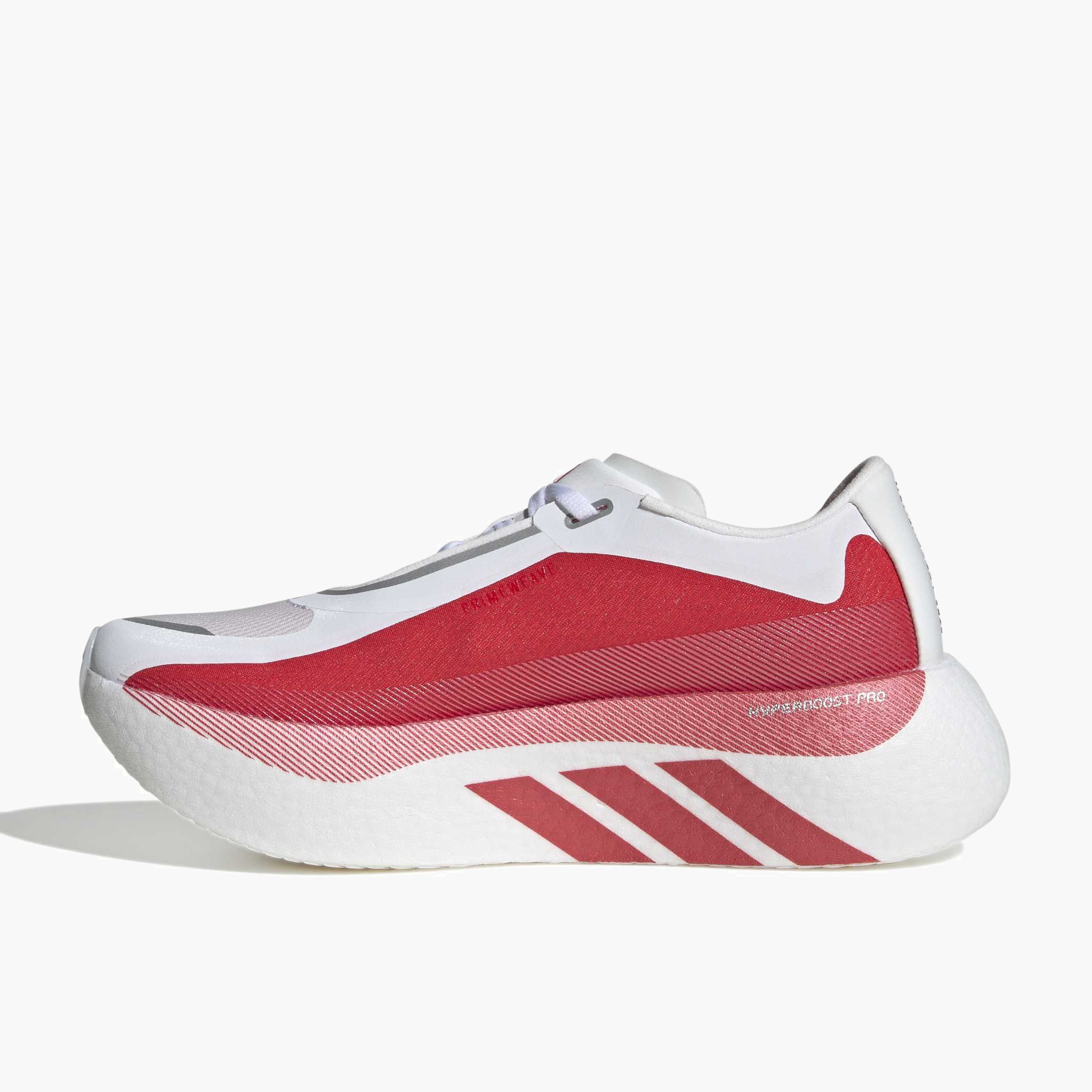 Medial angle shot of Women's Hyperboost Edge in Ftwr White / Pure Ruby / Zero Met.
