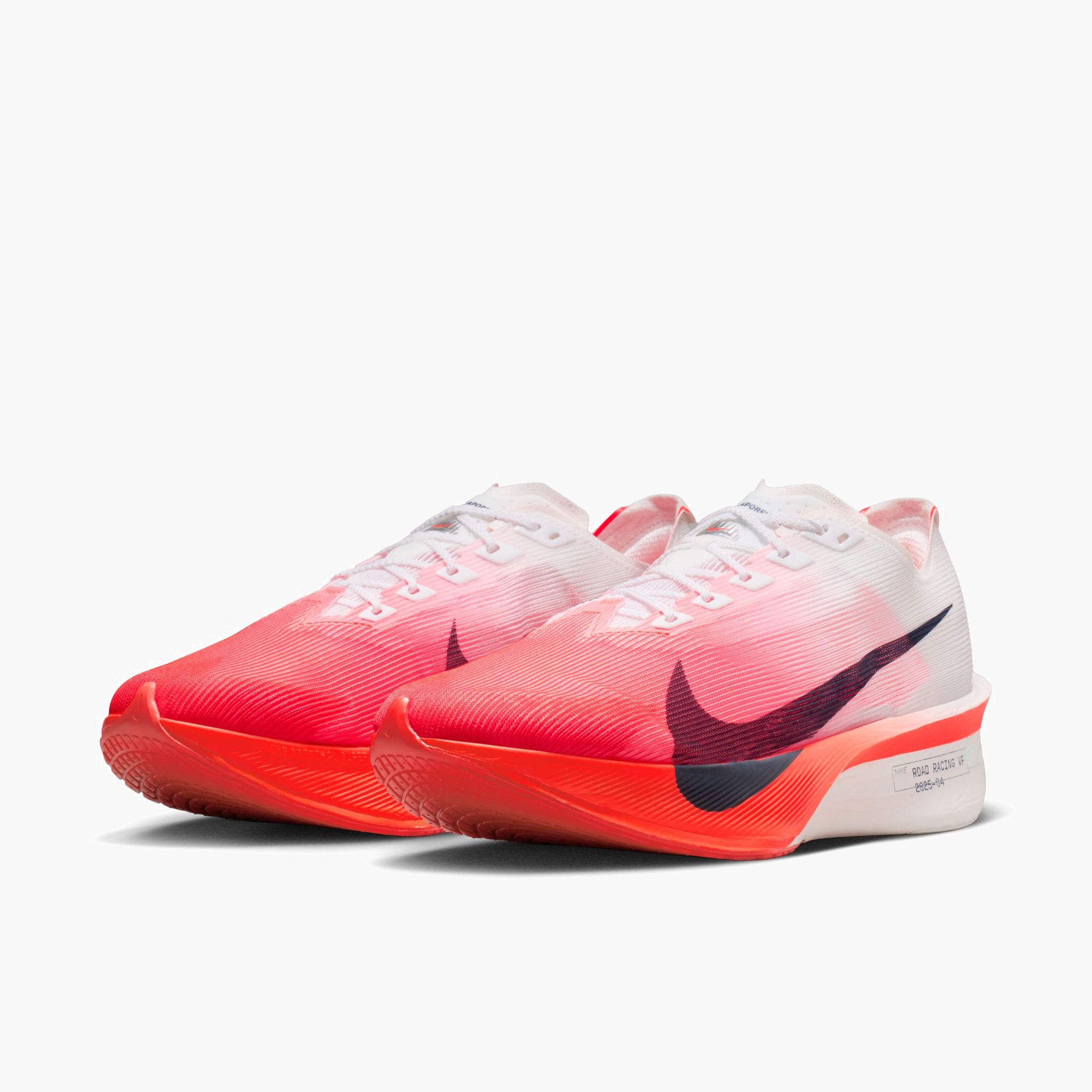 3/4 angle shot of Men's Vaporfly 4 in White / Midnight Navy-Bright Crimson