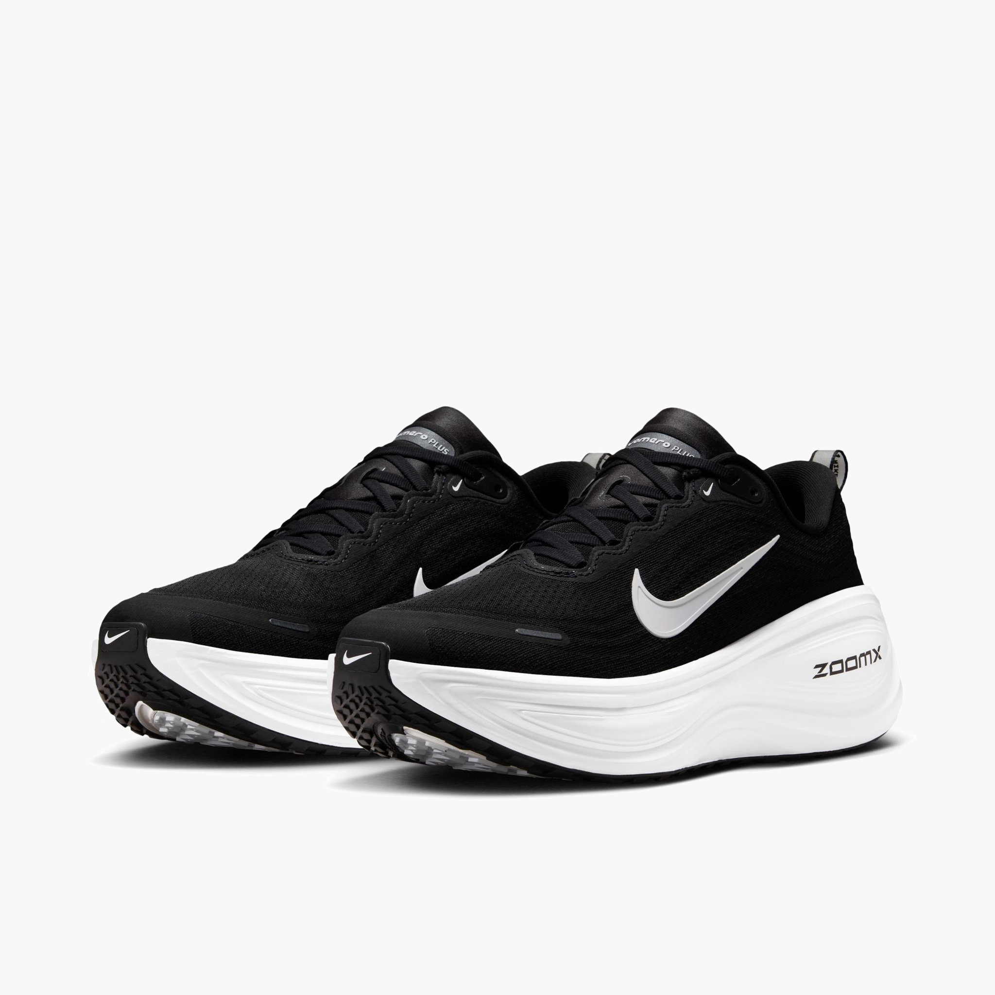 3/4 angle shot of Men's Vomero Plus in Black / White-Cool Grey
