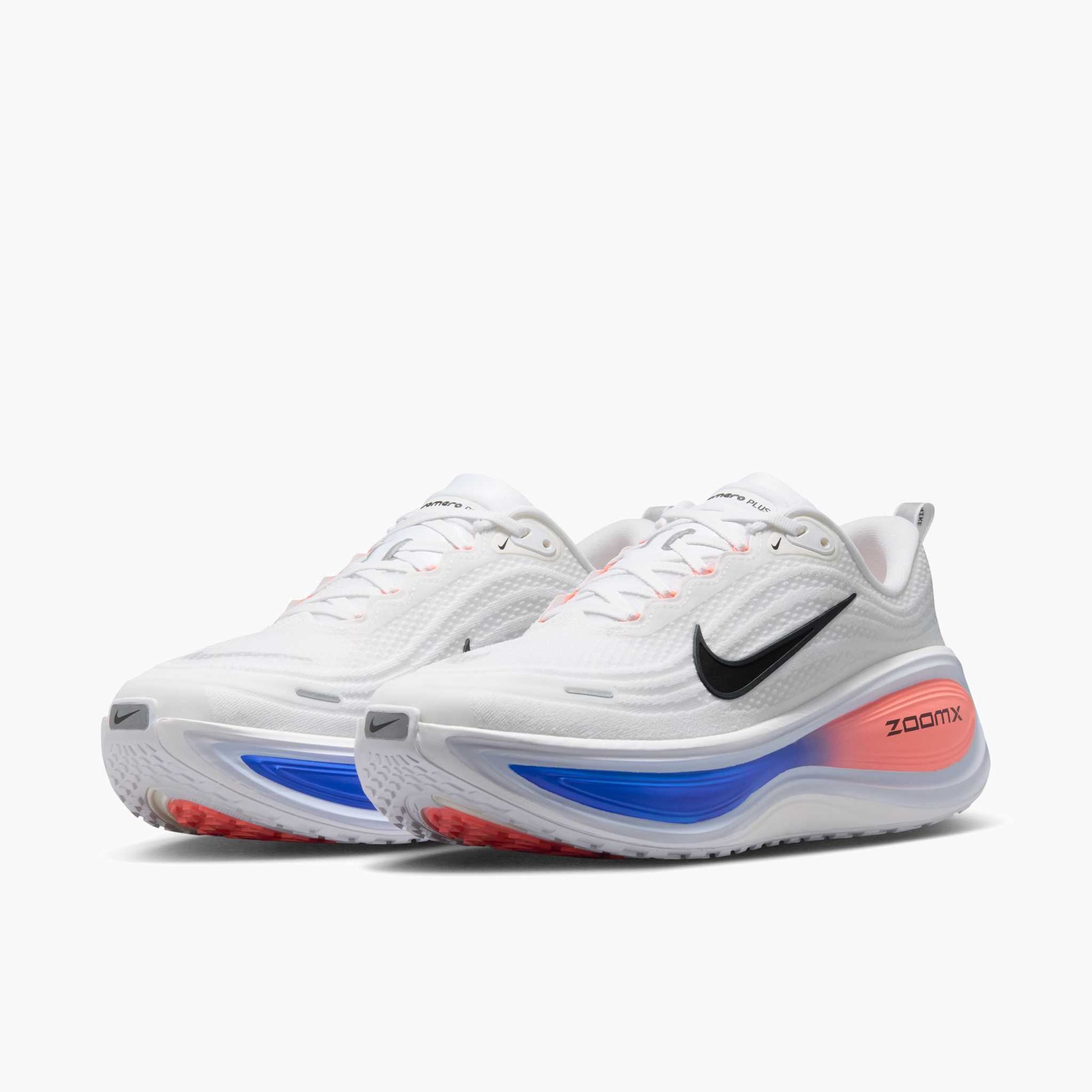 3/4 angle shot of Men's Vomero Plus in White / Black-Atomic Pink-Racer Blue