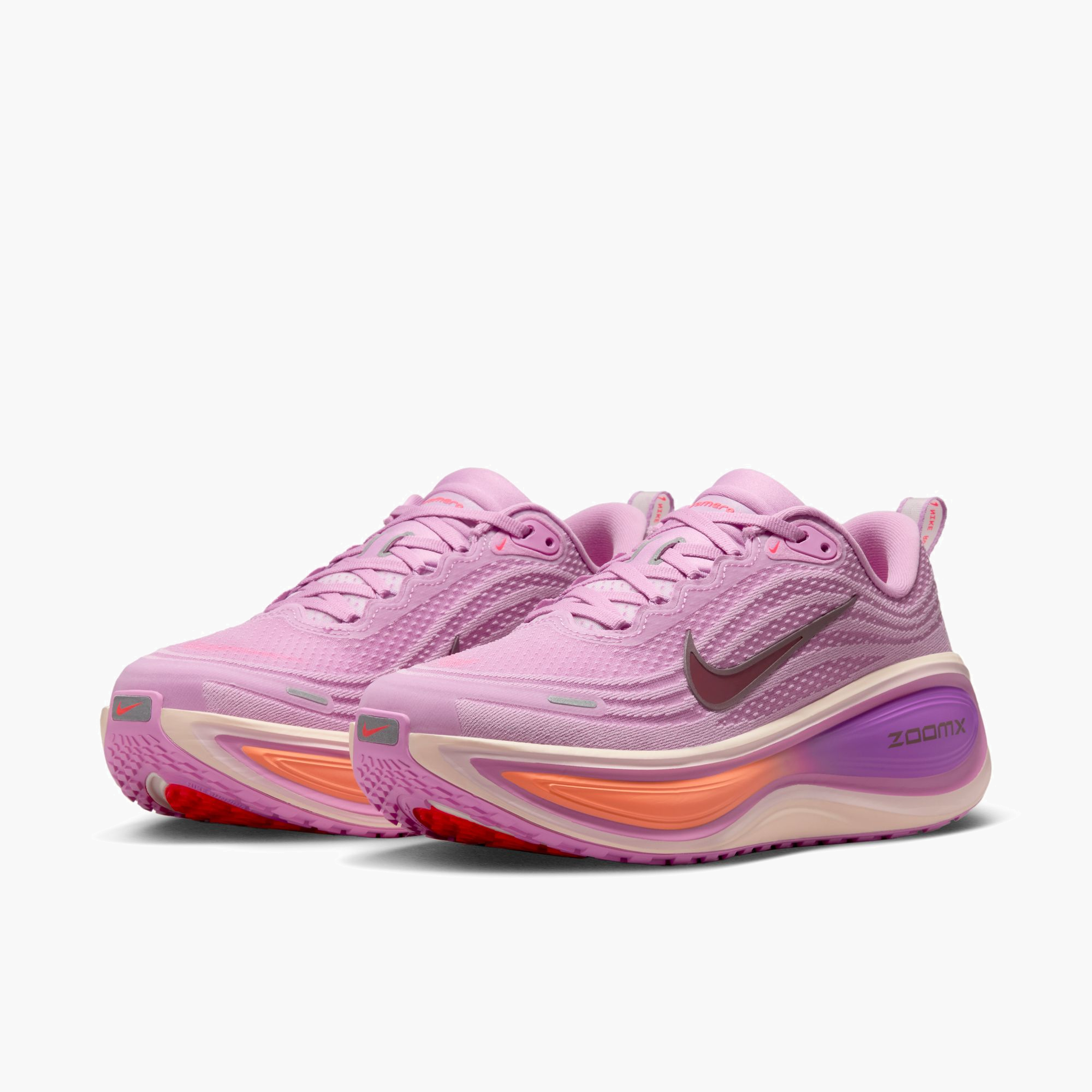 3/4 angle shot of Women's Vomero Plus in Lt Magenta / Black-Pink Foam-Bright Violet