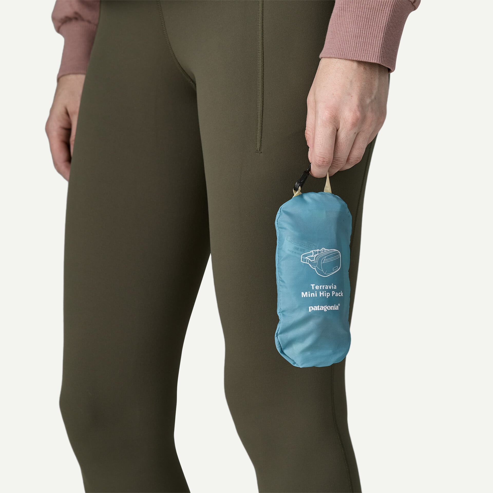 Patagonia Terravia Mini Hip Pack packed into its interior pocket
