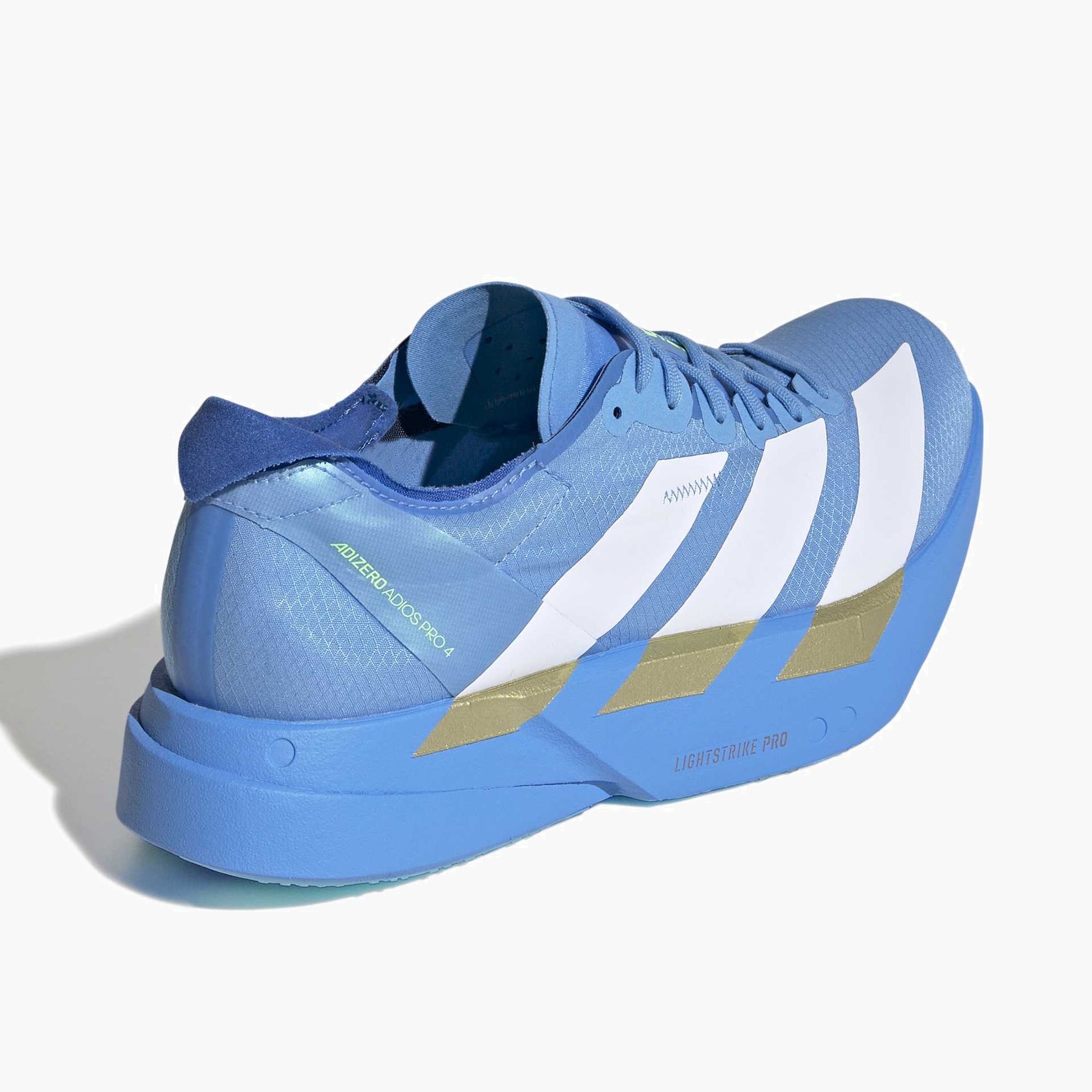 Top back angle shot of Women's Adios Pro 4 in Ftwwht / Ftwwht / Limbur