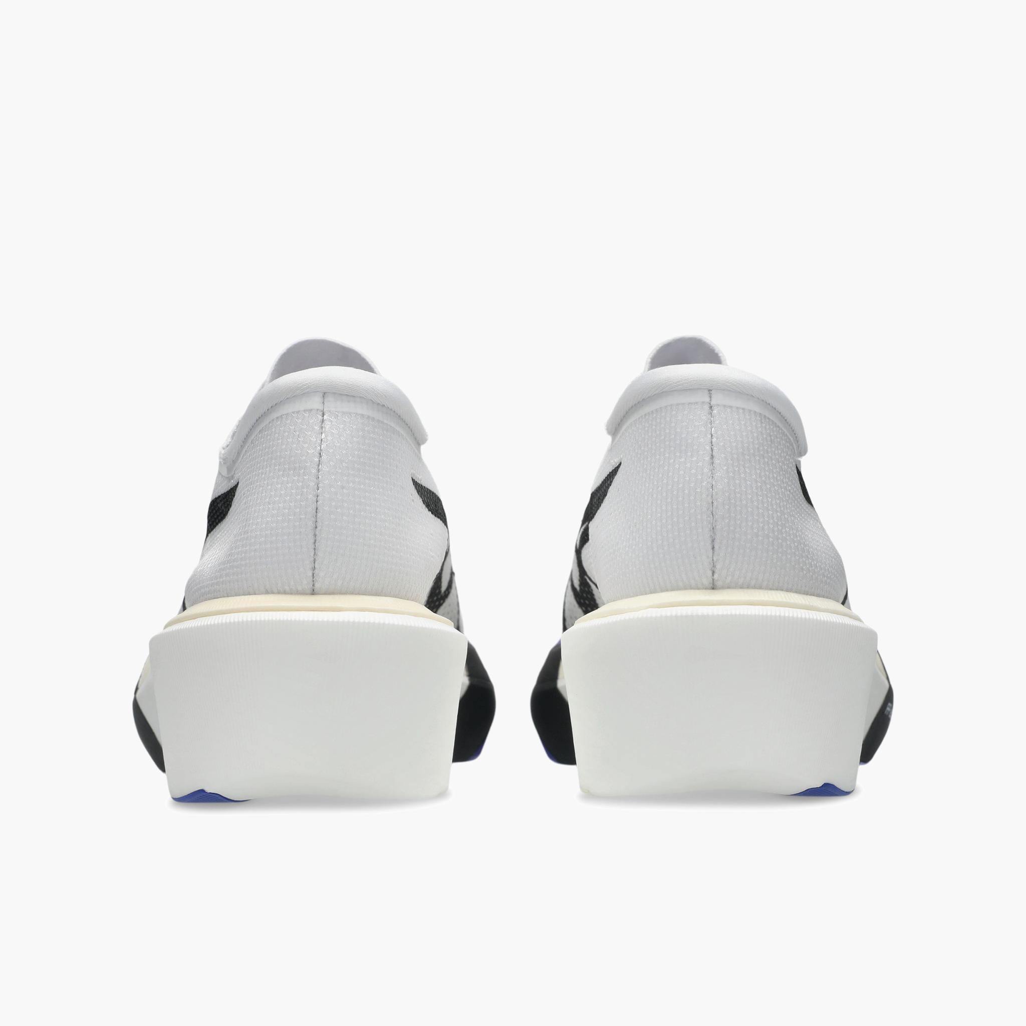 Heel angle shot of All Gender Metaspeed Sky in White / Cobalt Burst