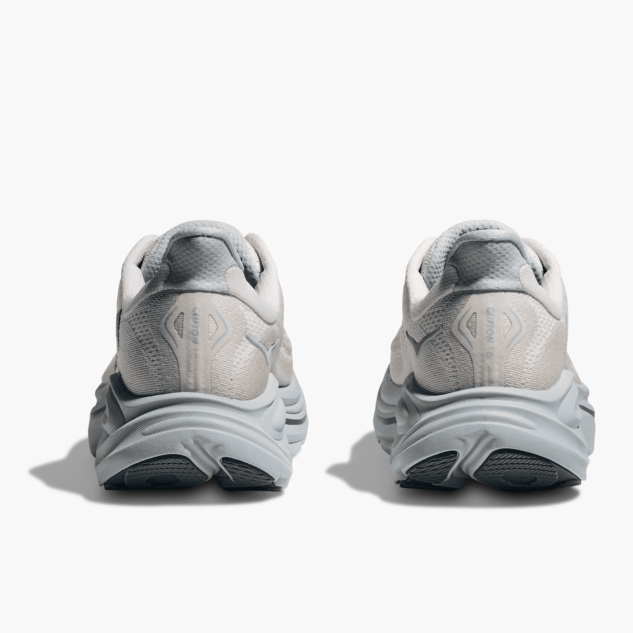 Heel angle shot of Women's Clifton 10 in Grout / Mineral Blue