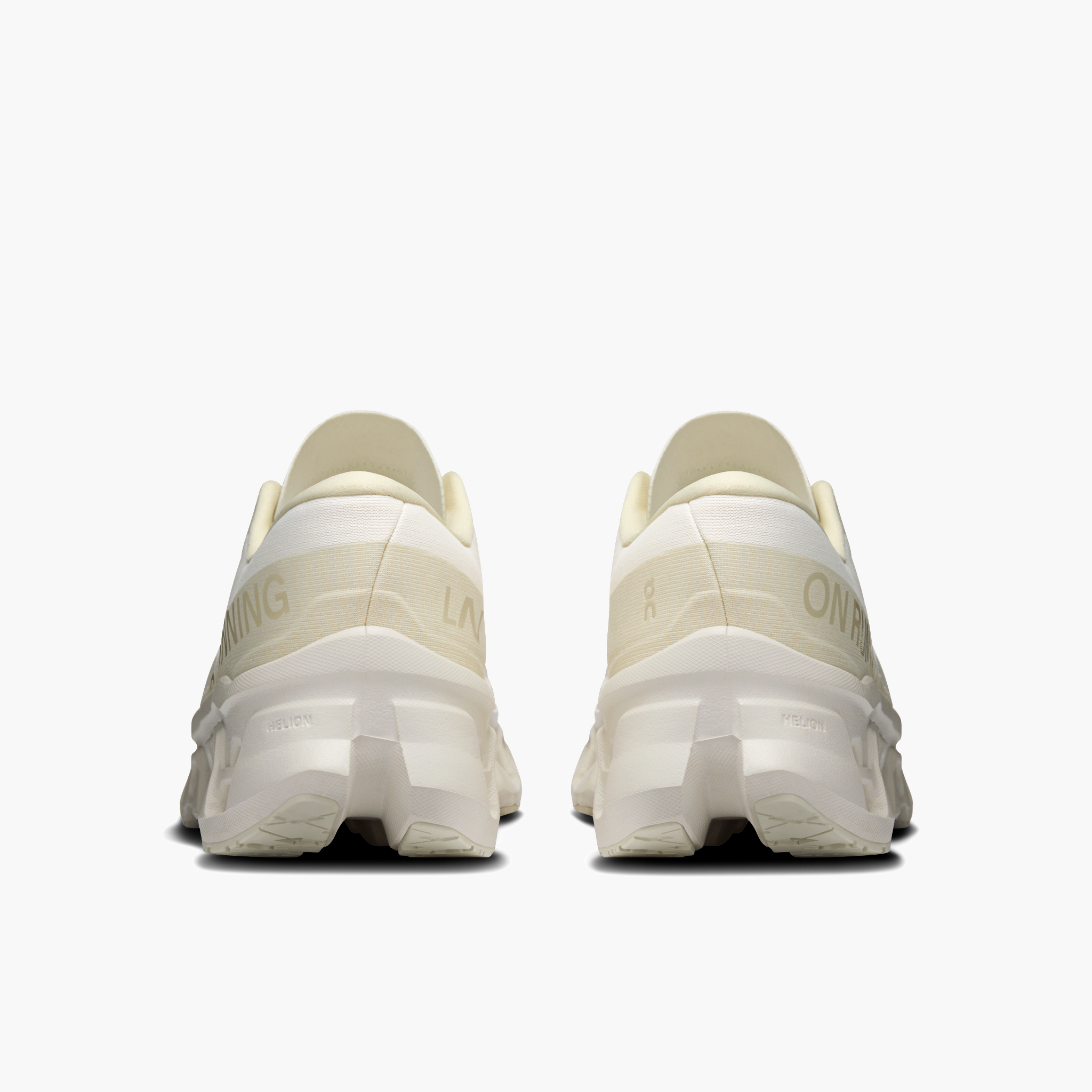 Heel angle shot of Women's Cloudmonster 3 in Ivory | Ray