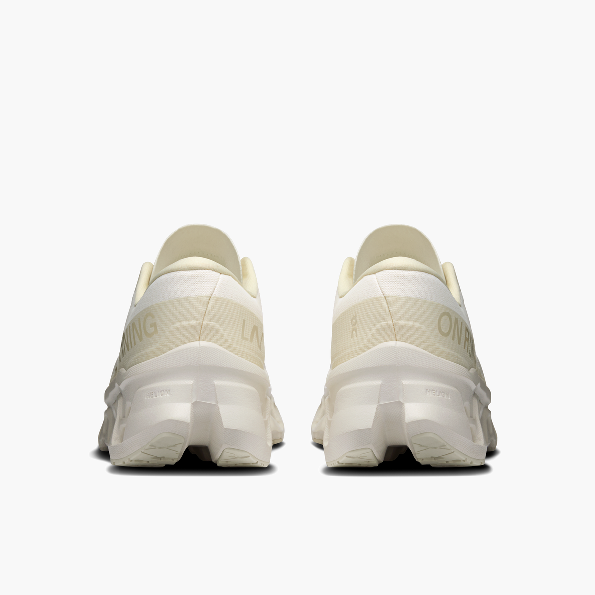 Heel angle shot of Women's Cloudmonster 3 in Ivory | Ray