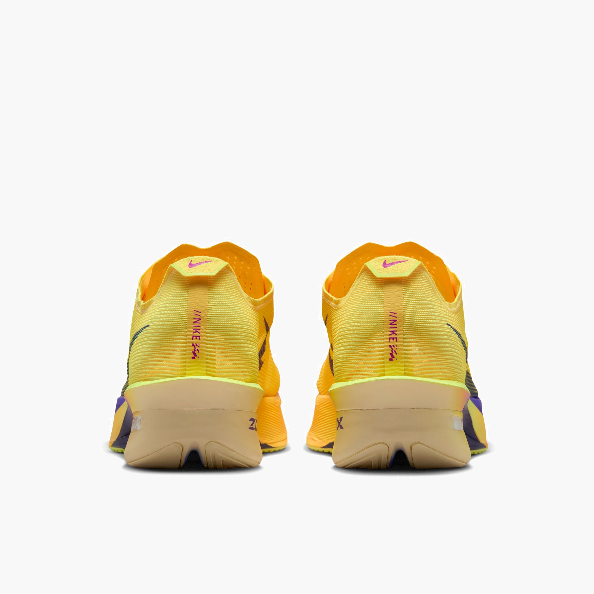 Heel angle shot of Women's Vaporfly 4 in Citron Pulse / Indigo Burst-Laser Orange