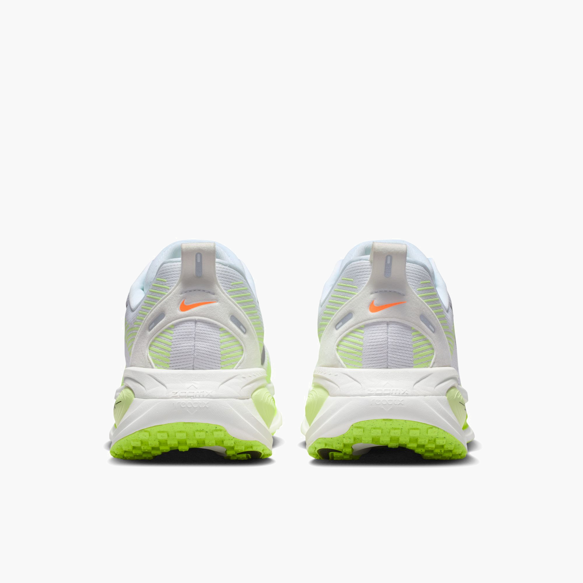 Heel angle shot of Men's Vomero 18 in White / Black-Volt-Barely Volt