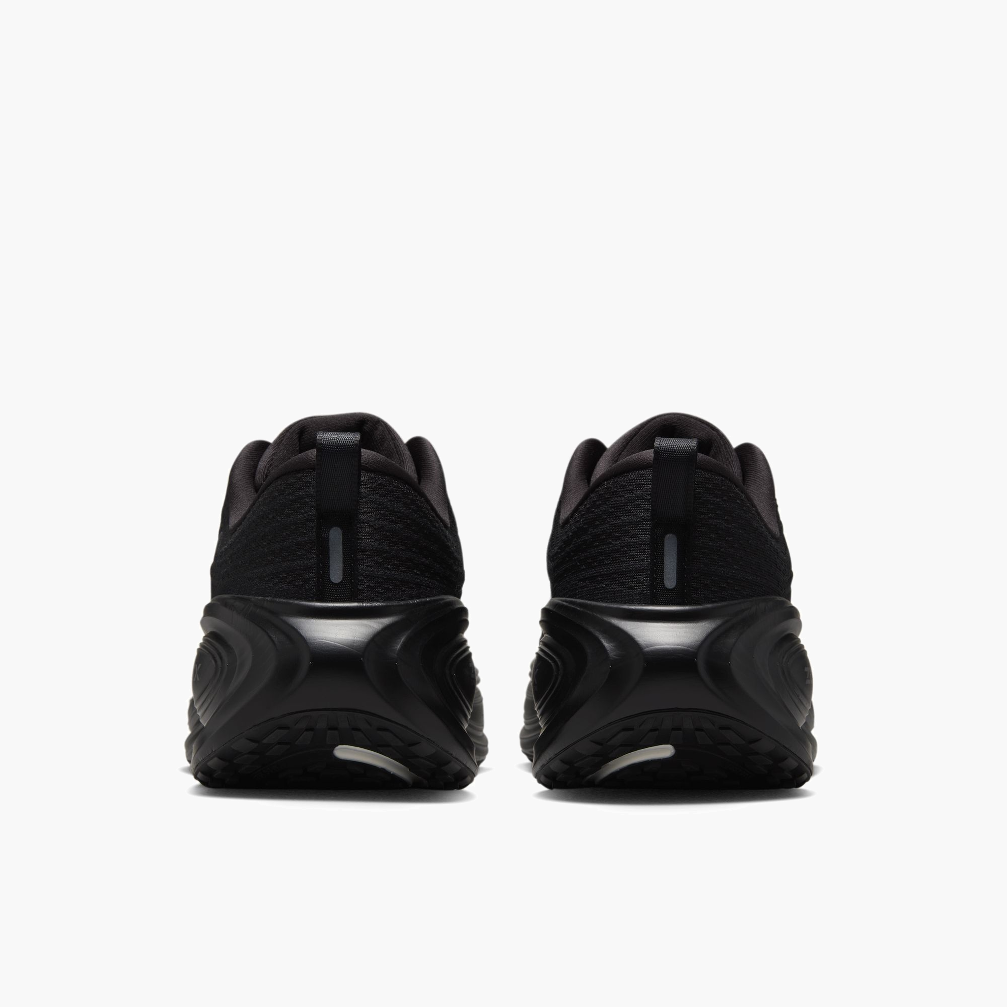 Heel angle shot of Men's Vomero Plus in Black / Dk Smoke Grey-Mtlc Dark Grey
