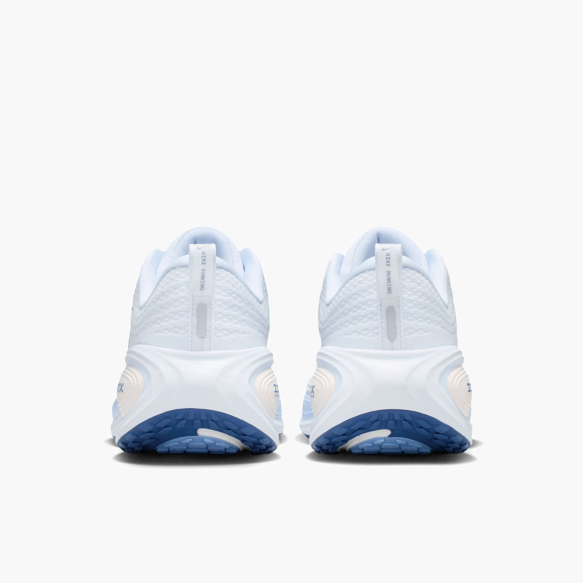 Heel angle shot of Women's Vomero Plus in White / Mystic Navy-Aluminum-Football Grey