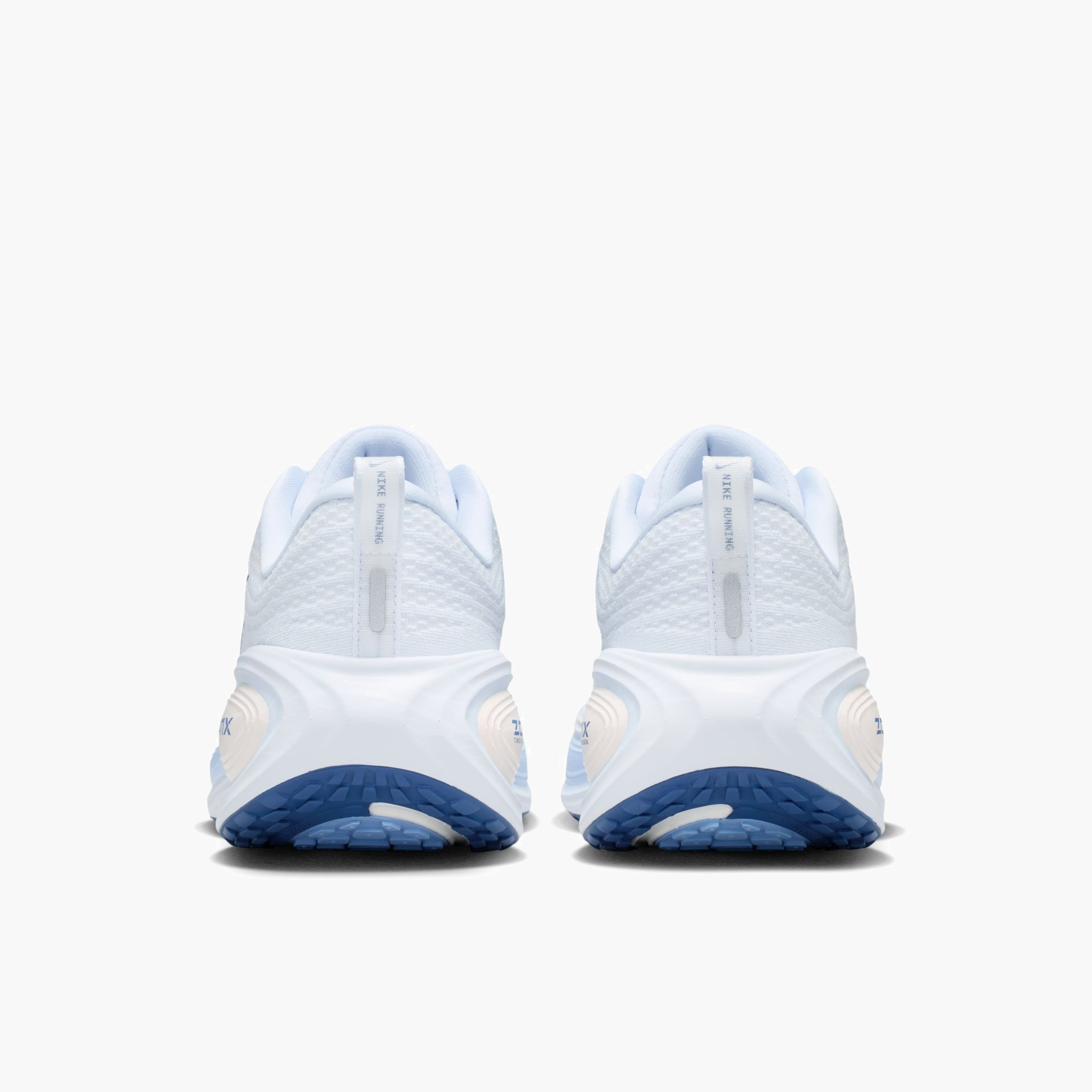 Heel angle shot of Women's Vomero Plus in White / Mystic Navy-Aluminum-Football Grey