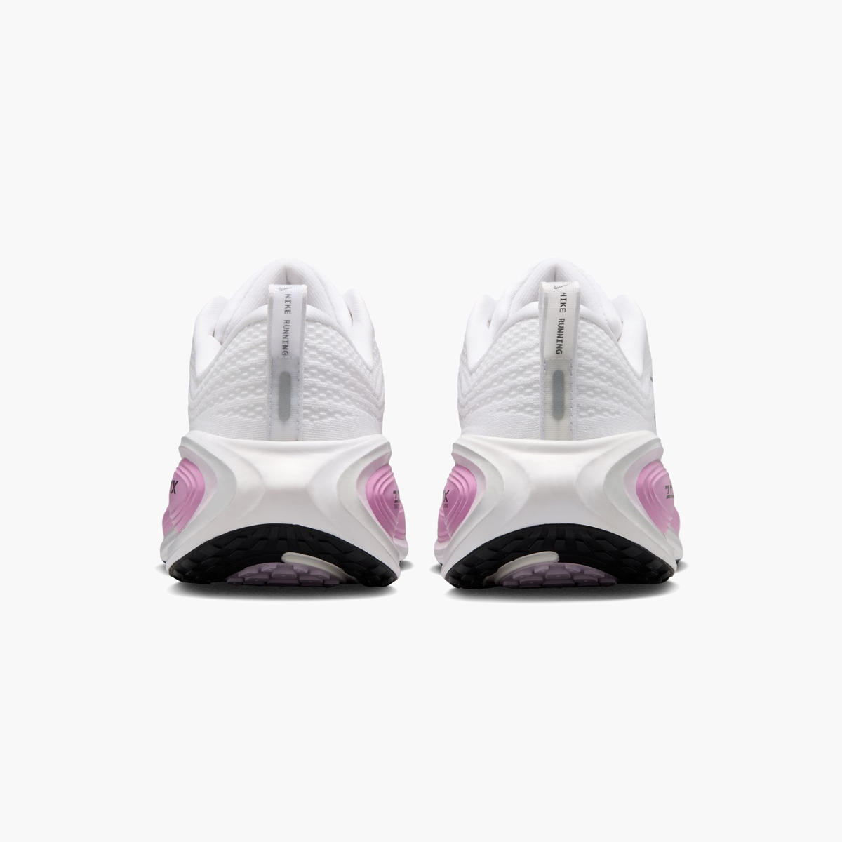 Heel angle shot of Women's Vomero Plus in White / Metallic Silver-Bleached Lilac