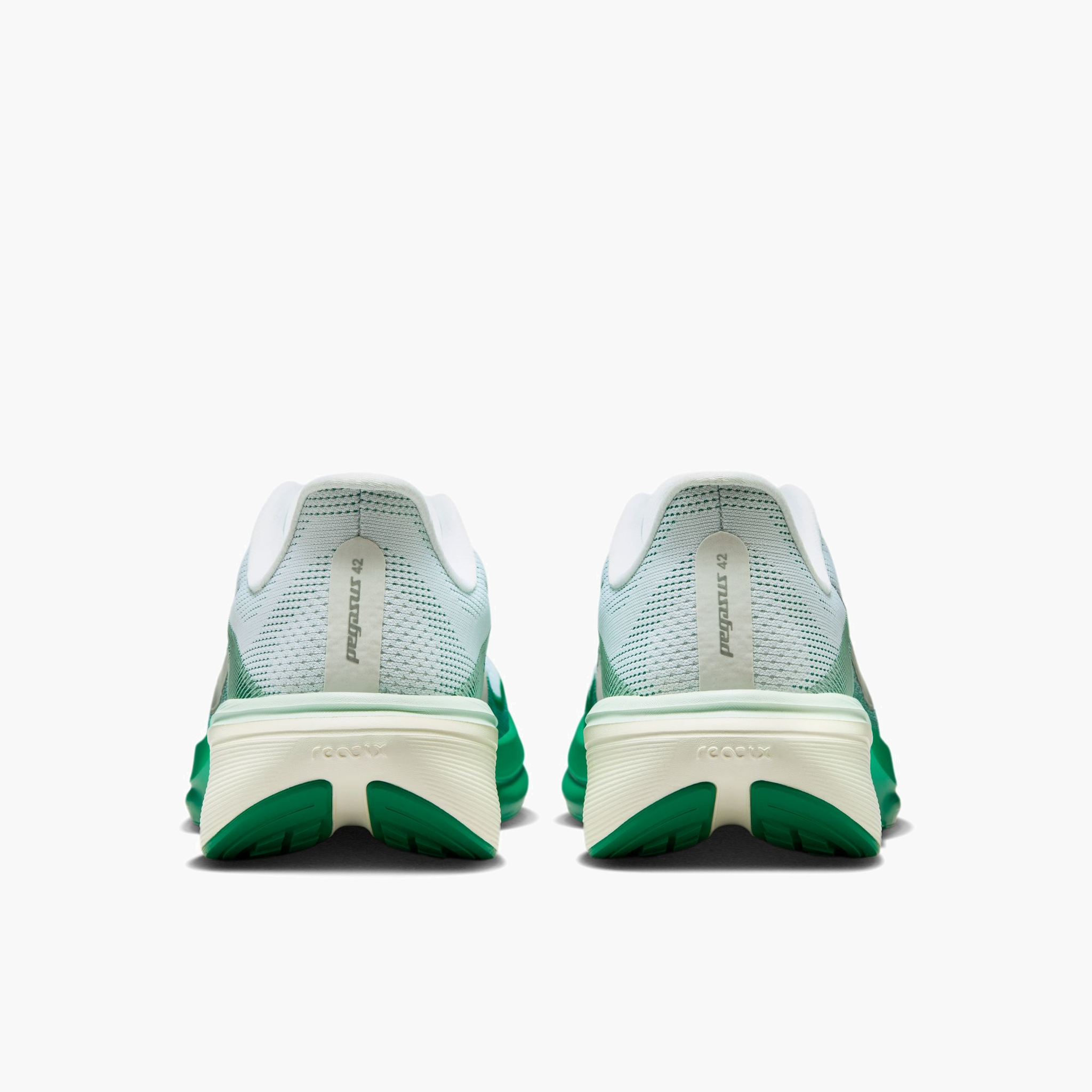 Heel angle shot of Women's Pegasus 42 in White / Metallic Silver-Malachite