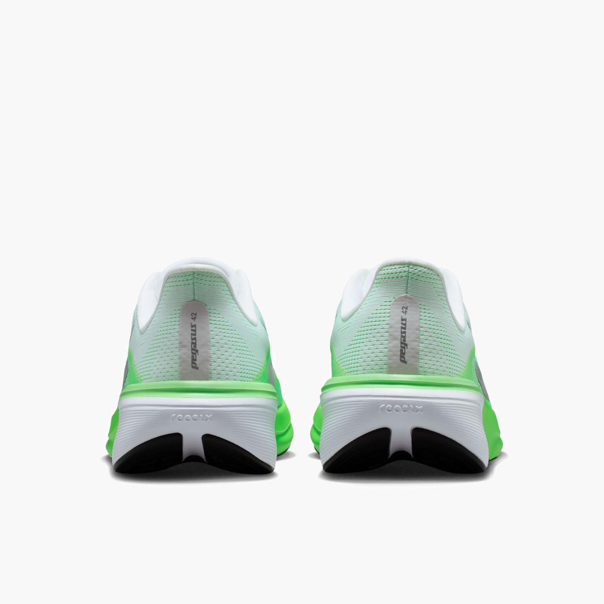Heel angle shot of Women's Pegasus 42 in White / Metallic Silver-Green Strike