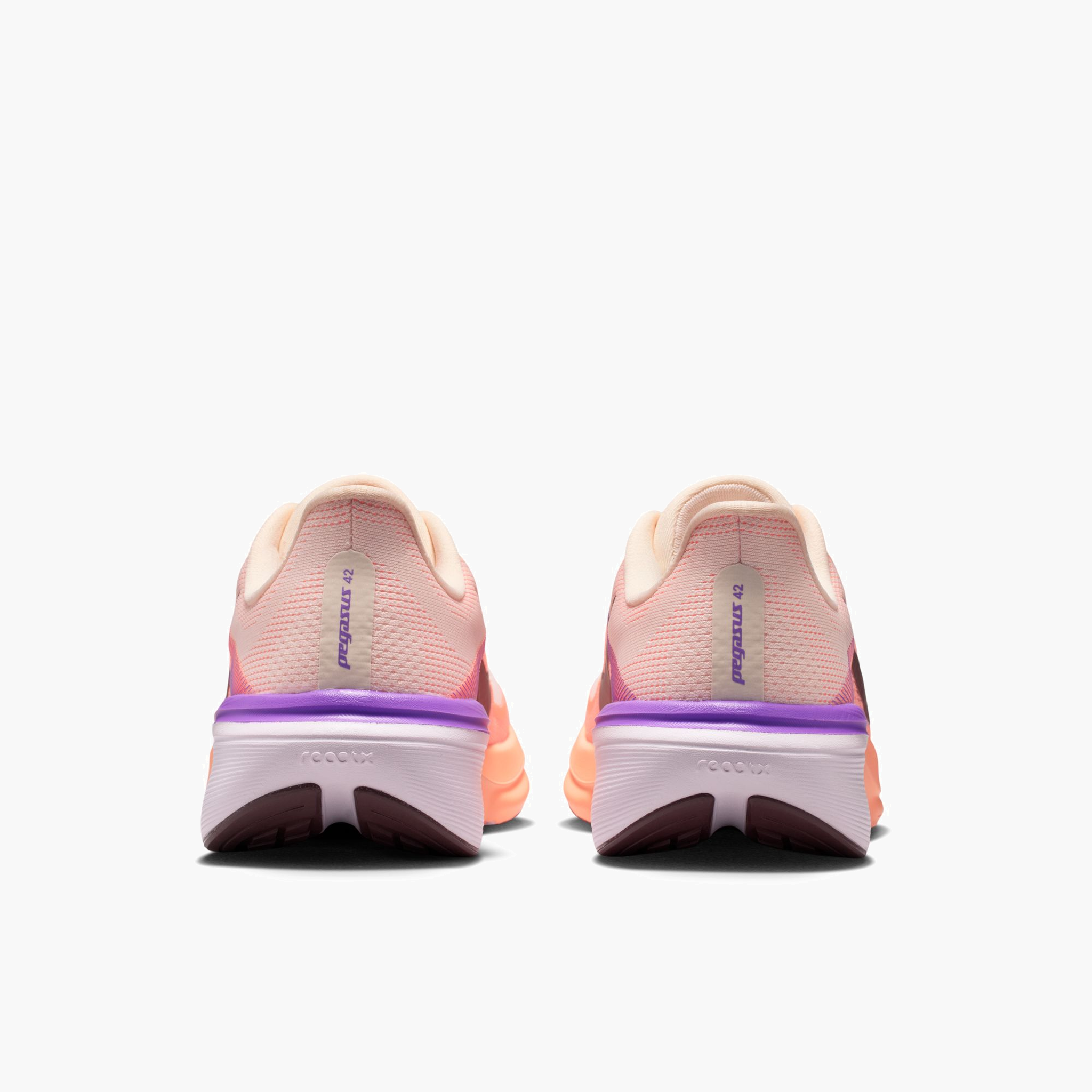 Heel angle shot of Women's Pegasus 42 in Chalk / Tattoo-Orange Pulse-Bright Violet