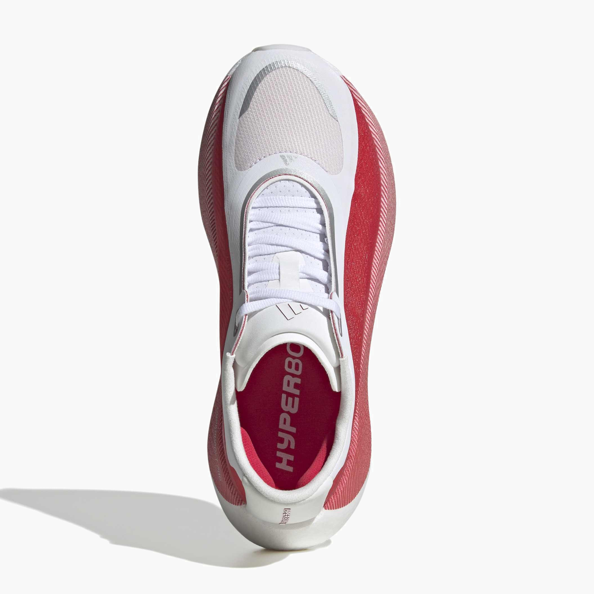 Overhead angle shot of Women's Hyperboost Edge in Ftwr White / Pure Ruby / Zero Met.