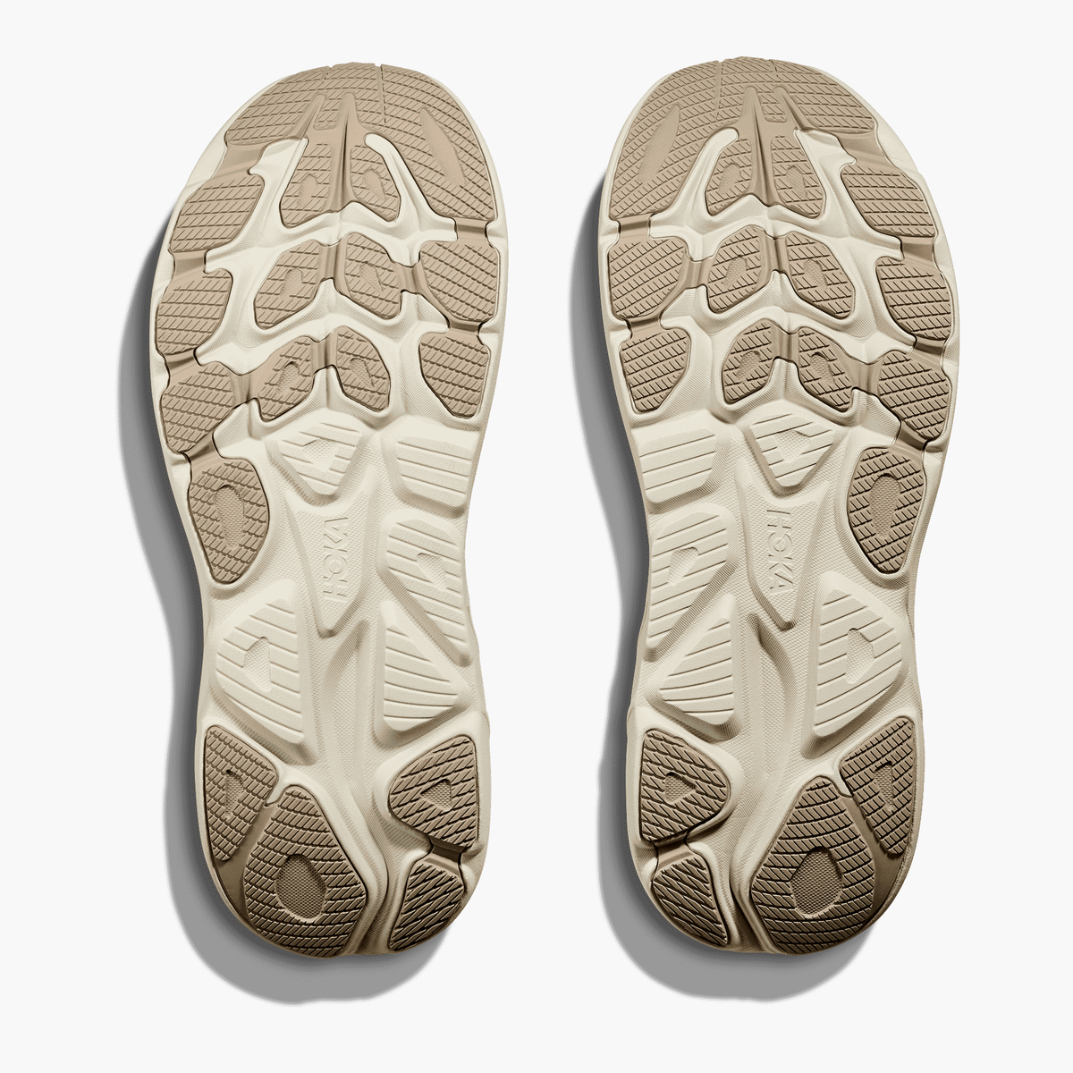 Sole angle shot of Men's Clifton 10 in Raw Linen / Stone
