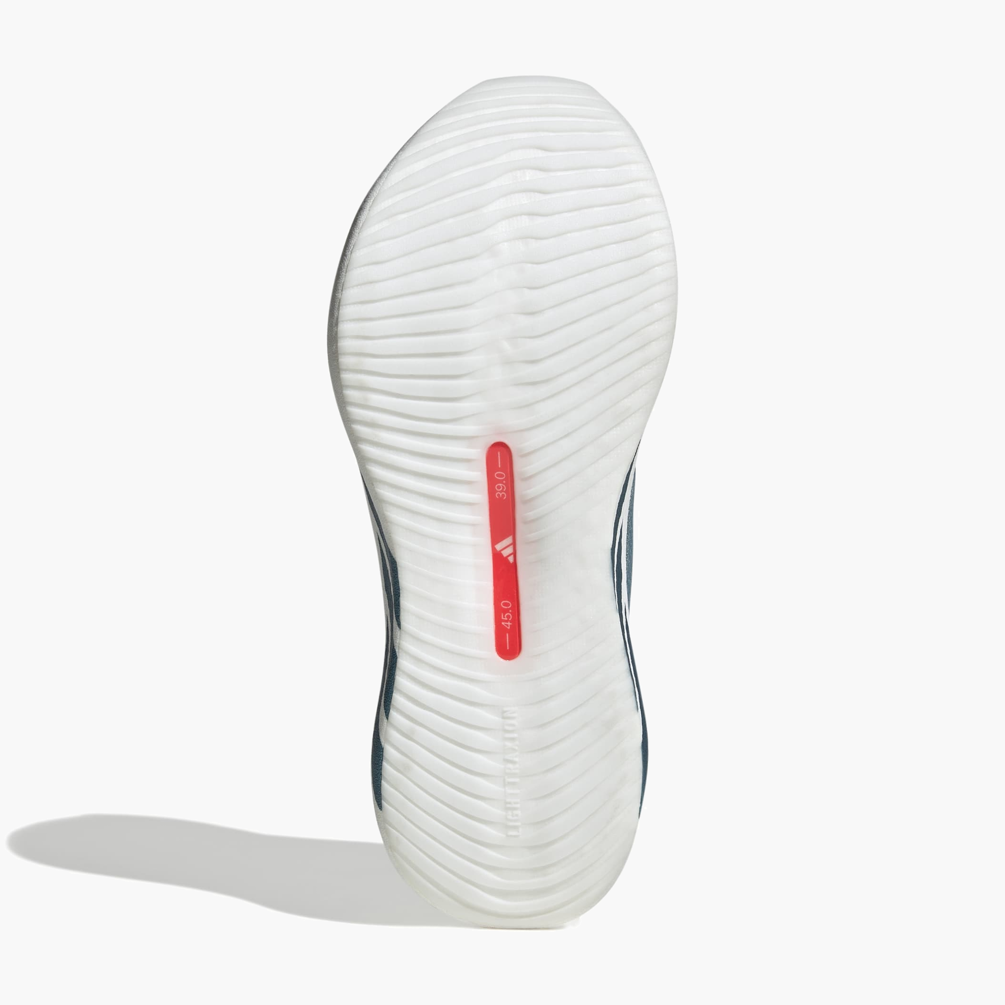 Sole angle shot of Women's Hyperboost Edge in Ftwr White / Petrol Met. / Lucid Red