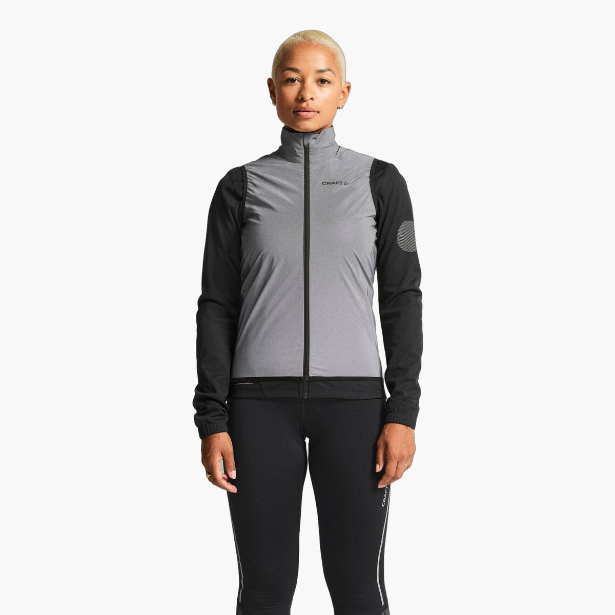 Women's Adv Essence Lumen Wind Vest — editorial source 2 [1916662-REFLECTIVE]
