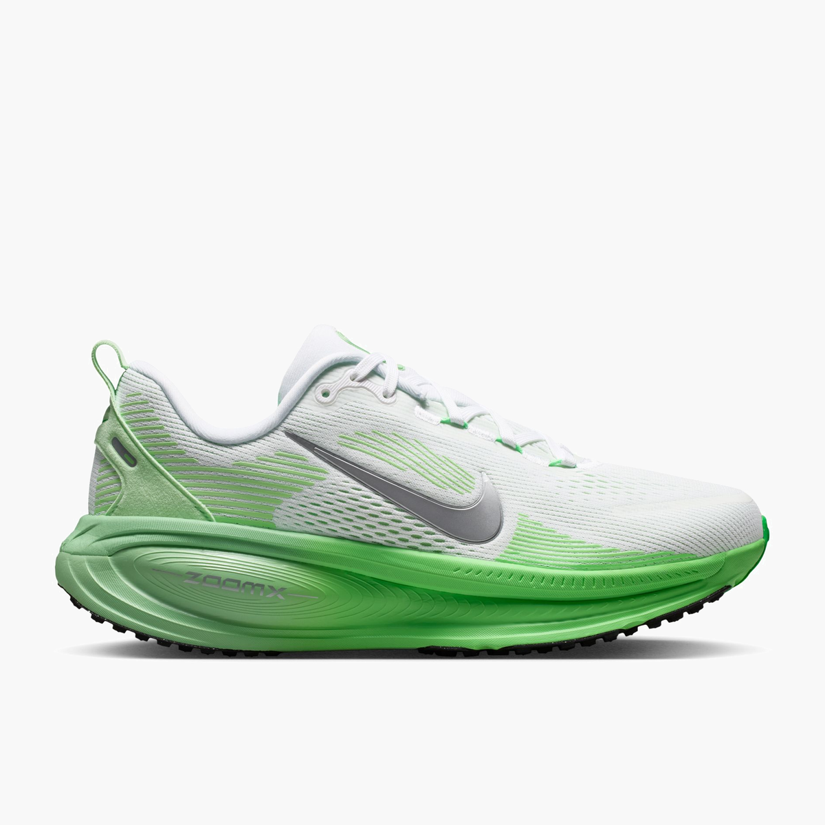 Lateral angle shot of Women's Vomero 18 in White / Metallic Silver-Illusion Green