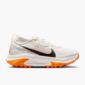 Lateral angle shot of Women's ACG Zegama in Summit White / Black-Phantom-Safety Orange