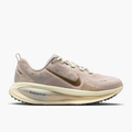 Lateral angle shot of Women's Vomero 18 in Cream Ii / Mtlc Gold Grain-Coconut Milk