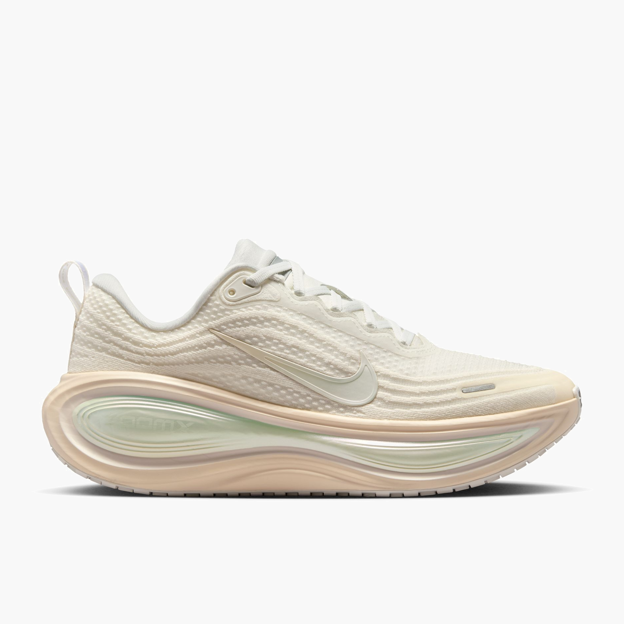 Lateral angle shot of Women's Vomero Plus in Summit White / Chalk-Phantom-Pure Platinum