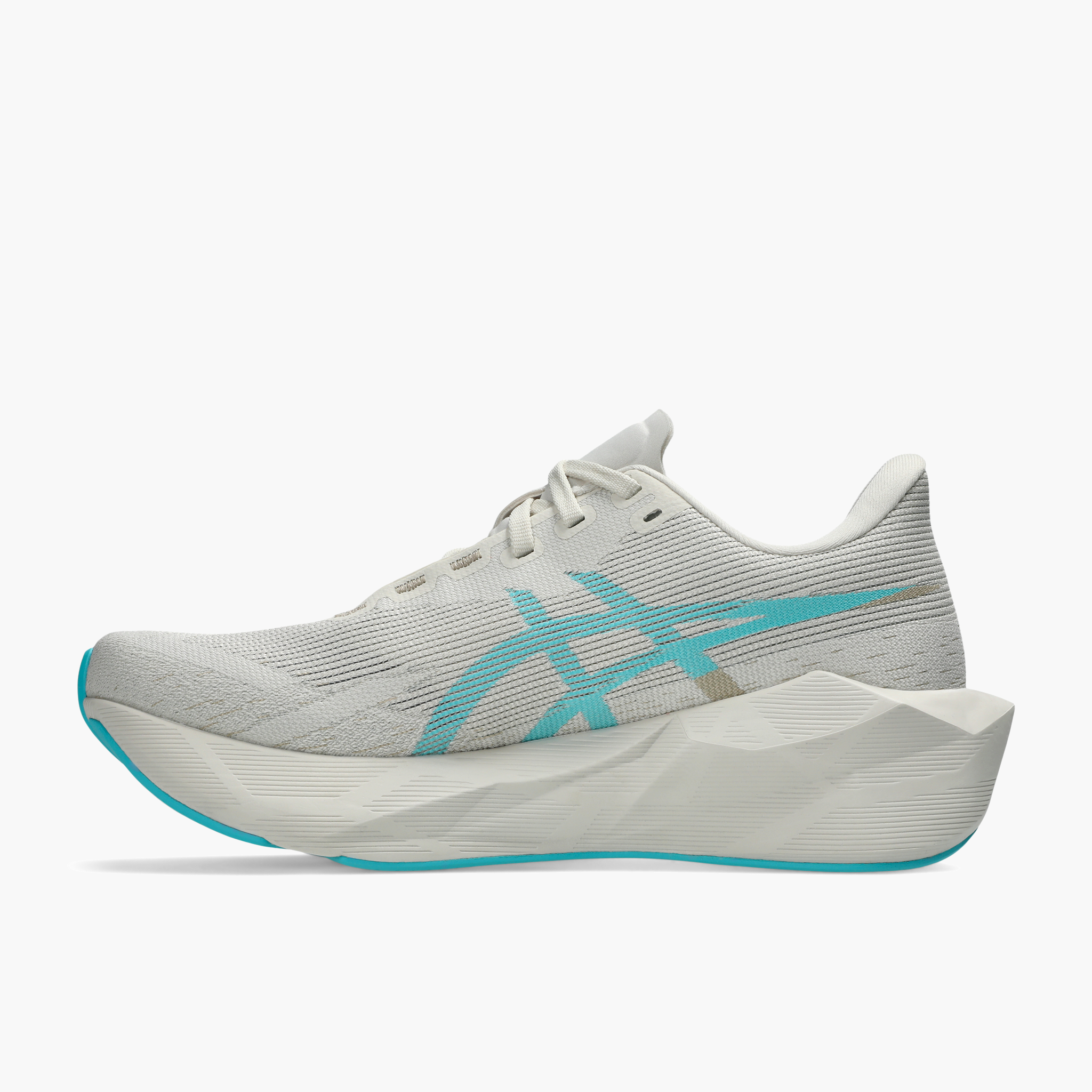 Medial angle shot of Women's Novablast 6 in Soft Oat / Energy Aqua