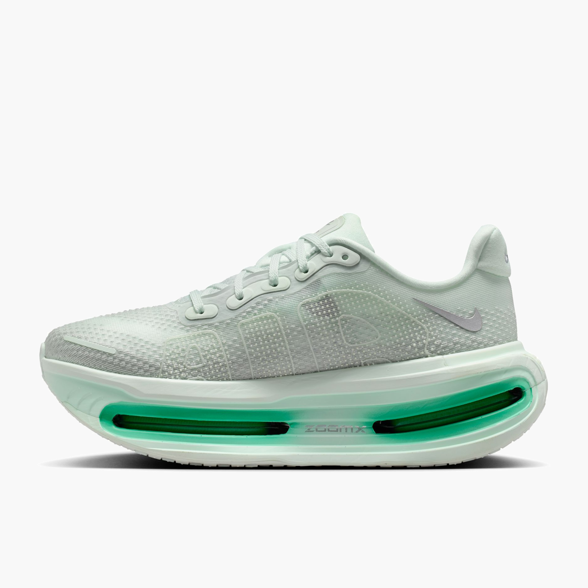 Medial angle shot of Women's Vomero Premium in Barely Green / Metallic Silver