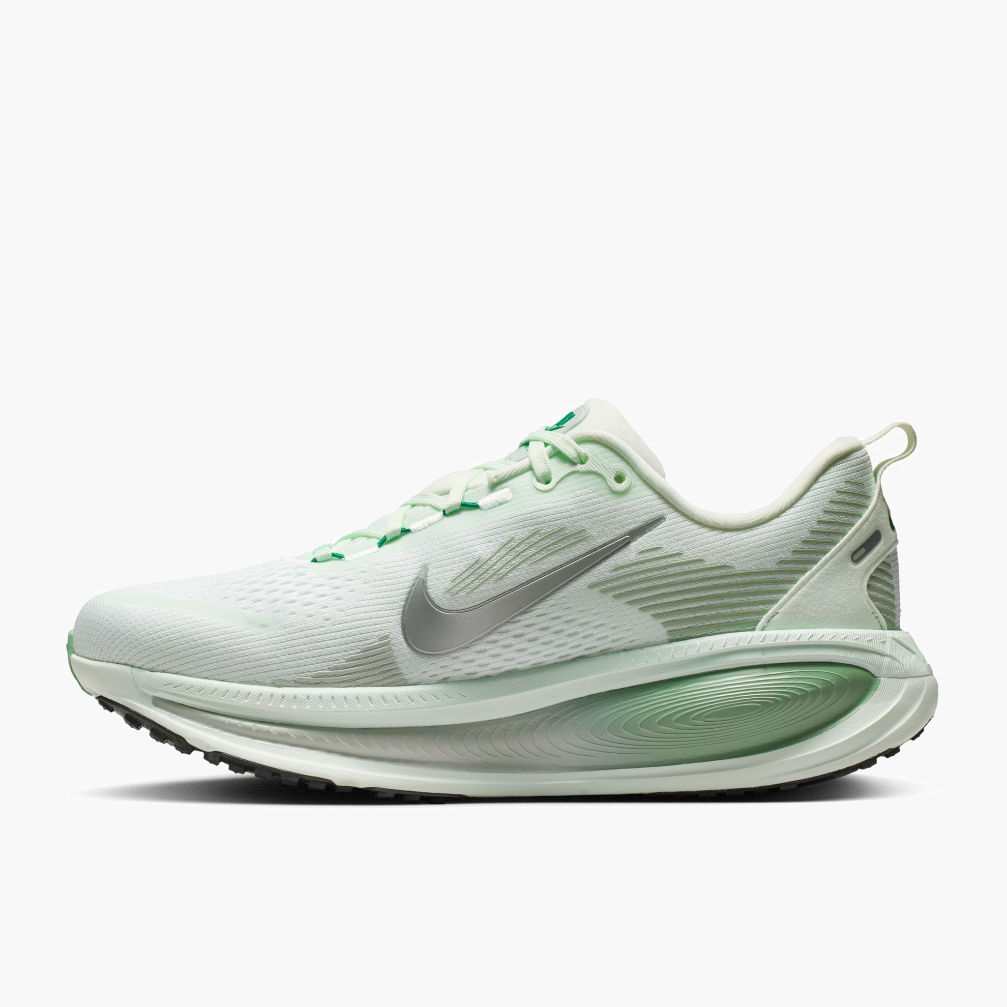 Medial angle shot of Women's Vomero 18 in Barely Green / Metallic Silver-Steam