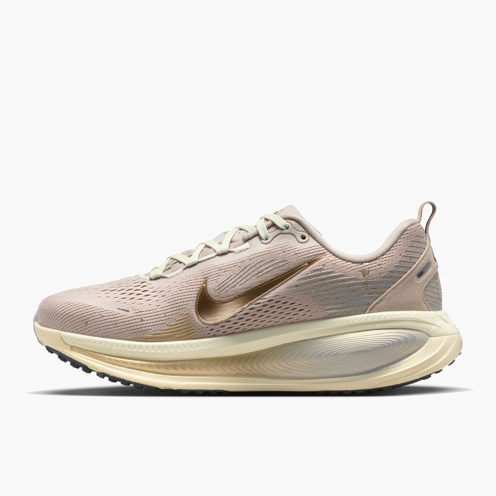 Medial angle shot of Women's Vomero 18 in Cream Ii / Mtlc Gold Grain-Coconut Milk