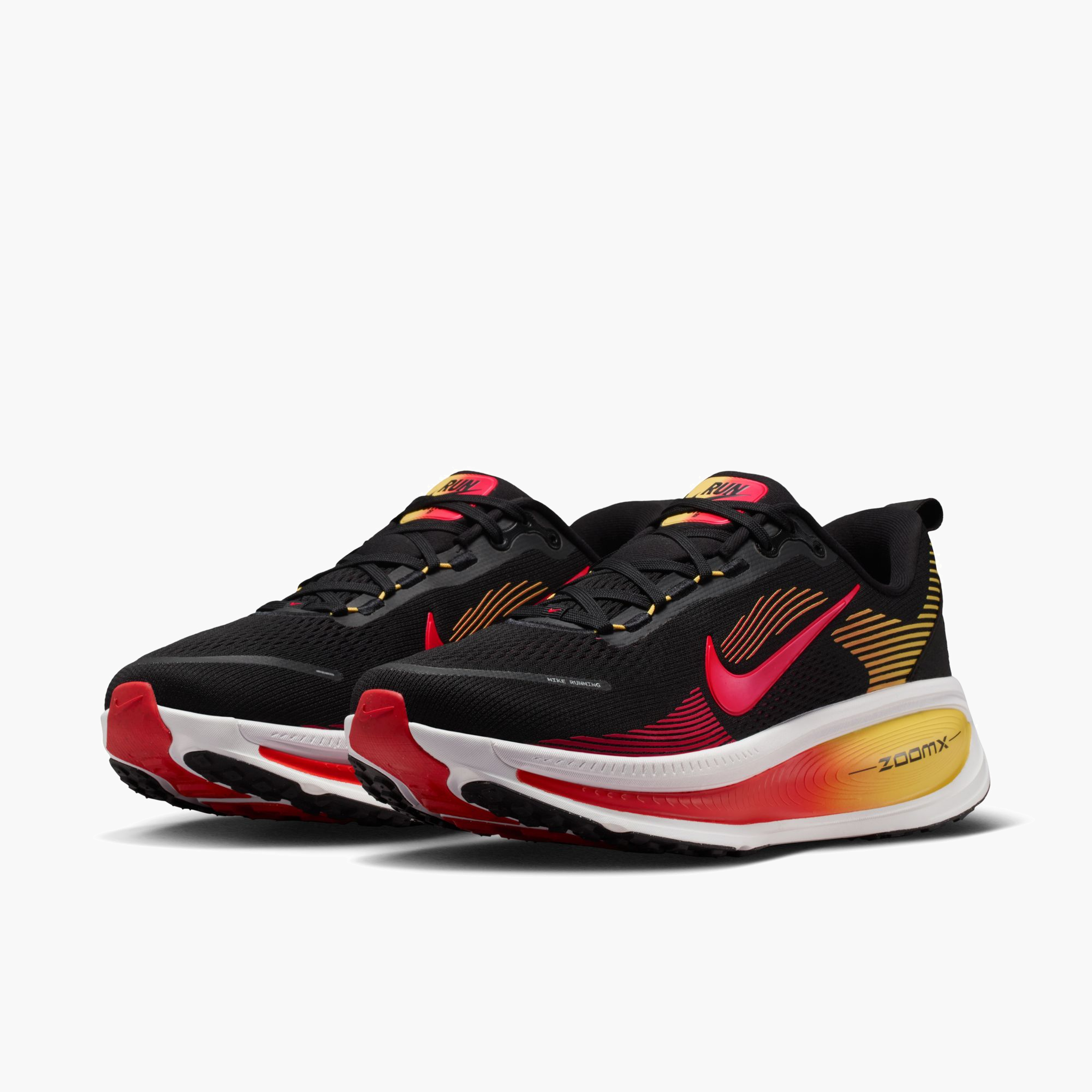 3/4 angle shot of Men's Vomero 18 in Black / Bright Crimson-Lt Crimson