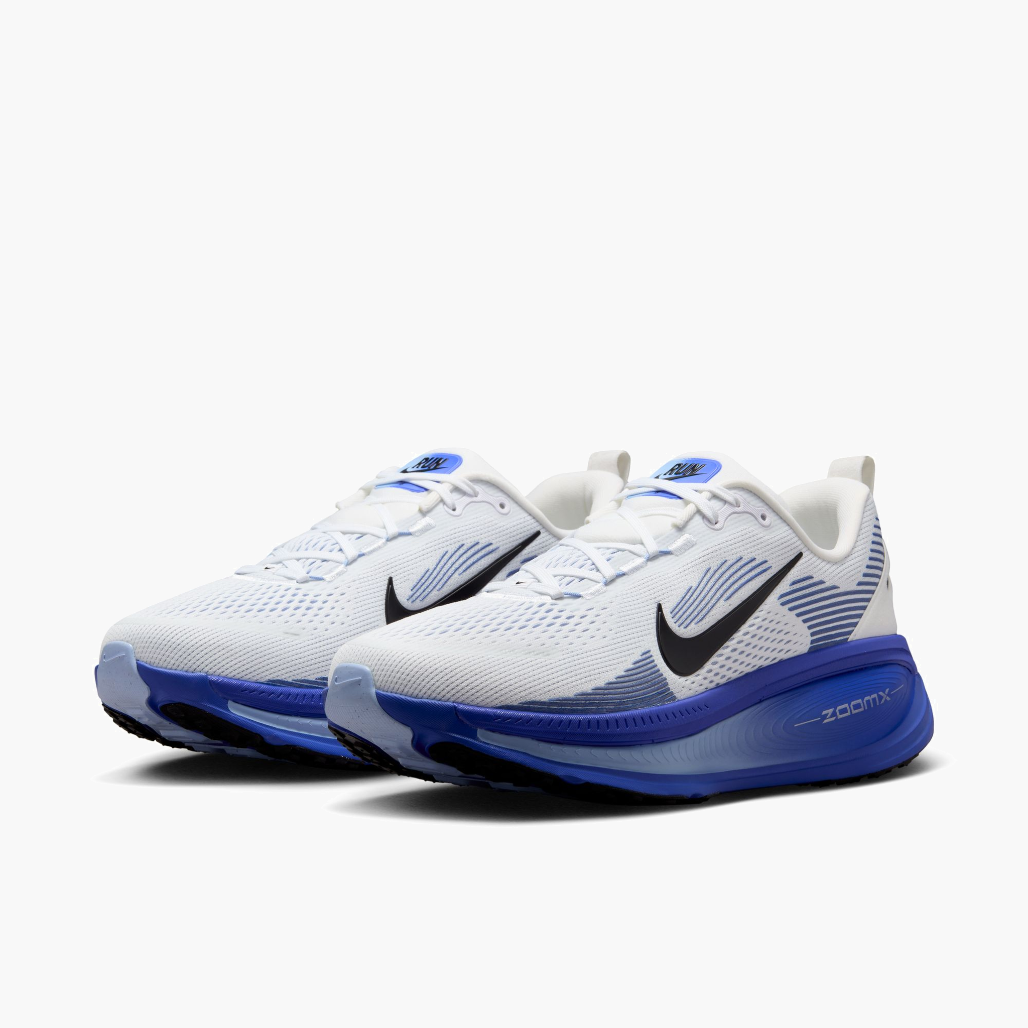 3/4 angle shot of Men's Vomero 18 in White / Black-Blue Tint-Light Marine