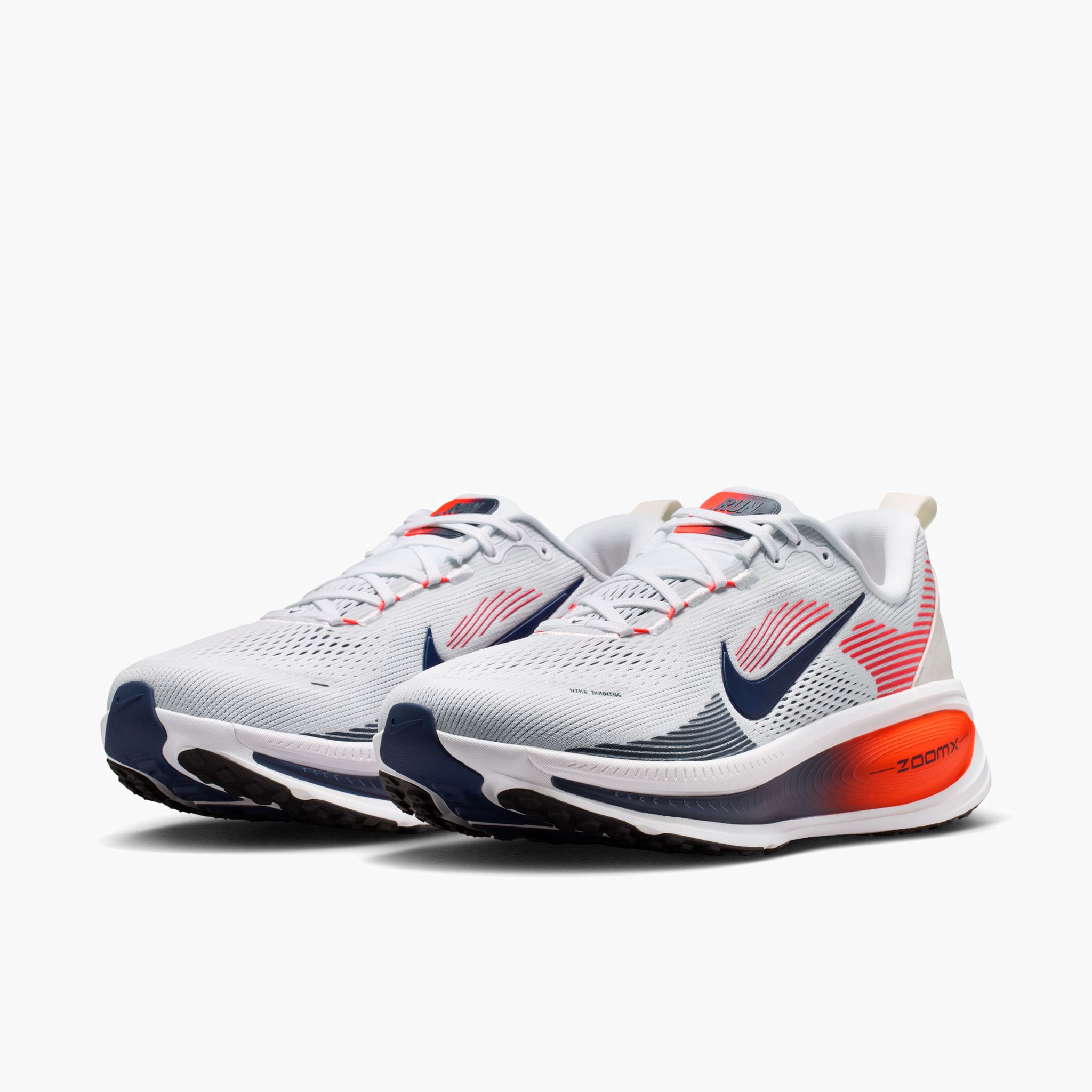 3/4 angle shot of Men's Vomero 18 in White / Midnight Navy-Bright Crimson-Black