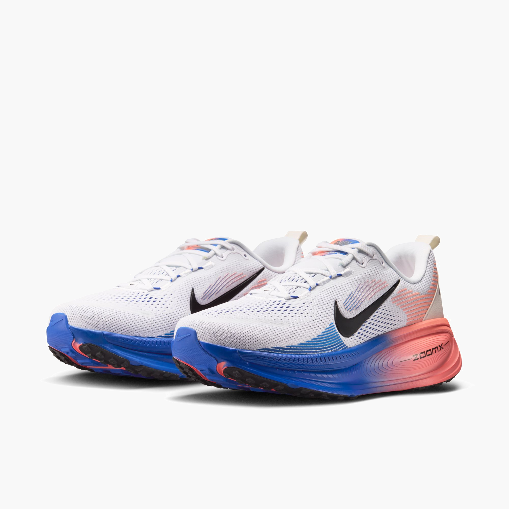 3/4 angle shot of Men's Vomero 18 in White / Black-Racer Blue-Atomic Pink