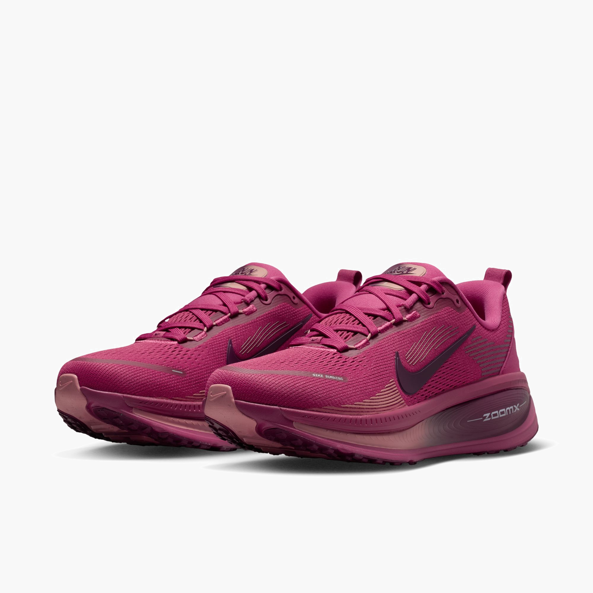 3/4 angle shot of Women's Vomero 18 in Sweet Beet / Bordeaux-Red Stardust