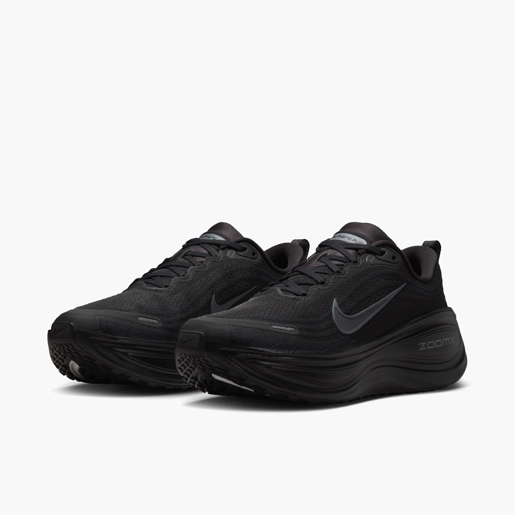 3/4 angle shot of Men's Vomero Plus in Black / Dk Smoke Grey-Mtlc Dark Grey