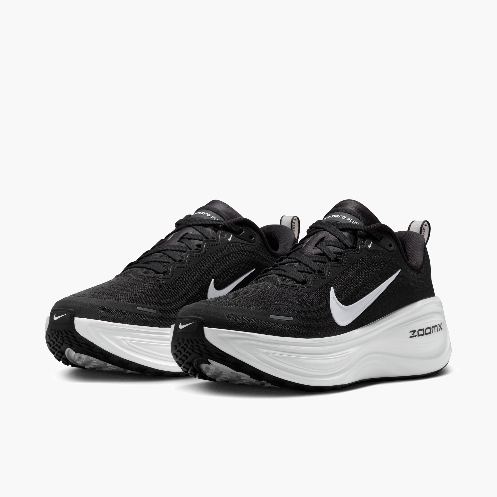 3/4 angle shot of Women's Vomero Plus in Black / White-Cool Grey-Mtlc Dark Grey
