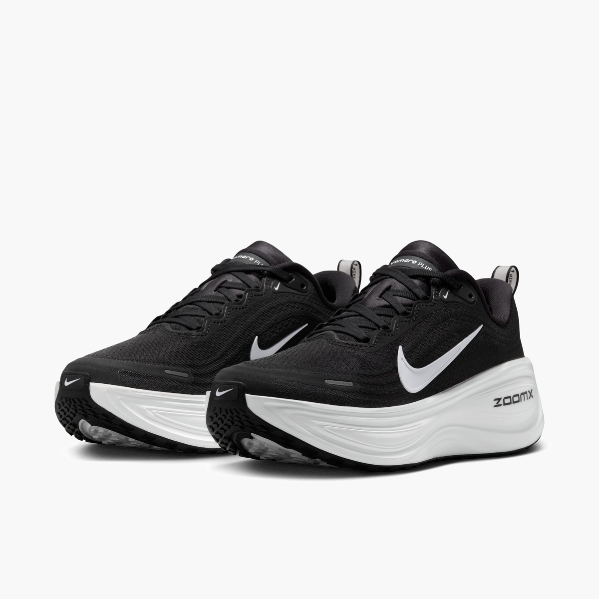 3/4 angle shot of Women's Vomero Plus in Black / White-Cool Grey-Mtlc Dark Grey