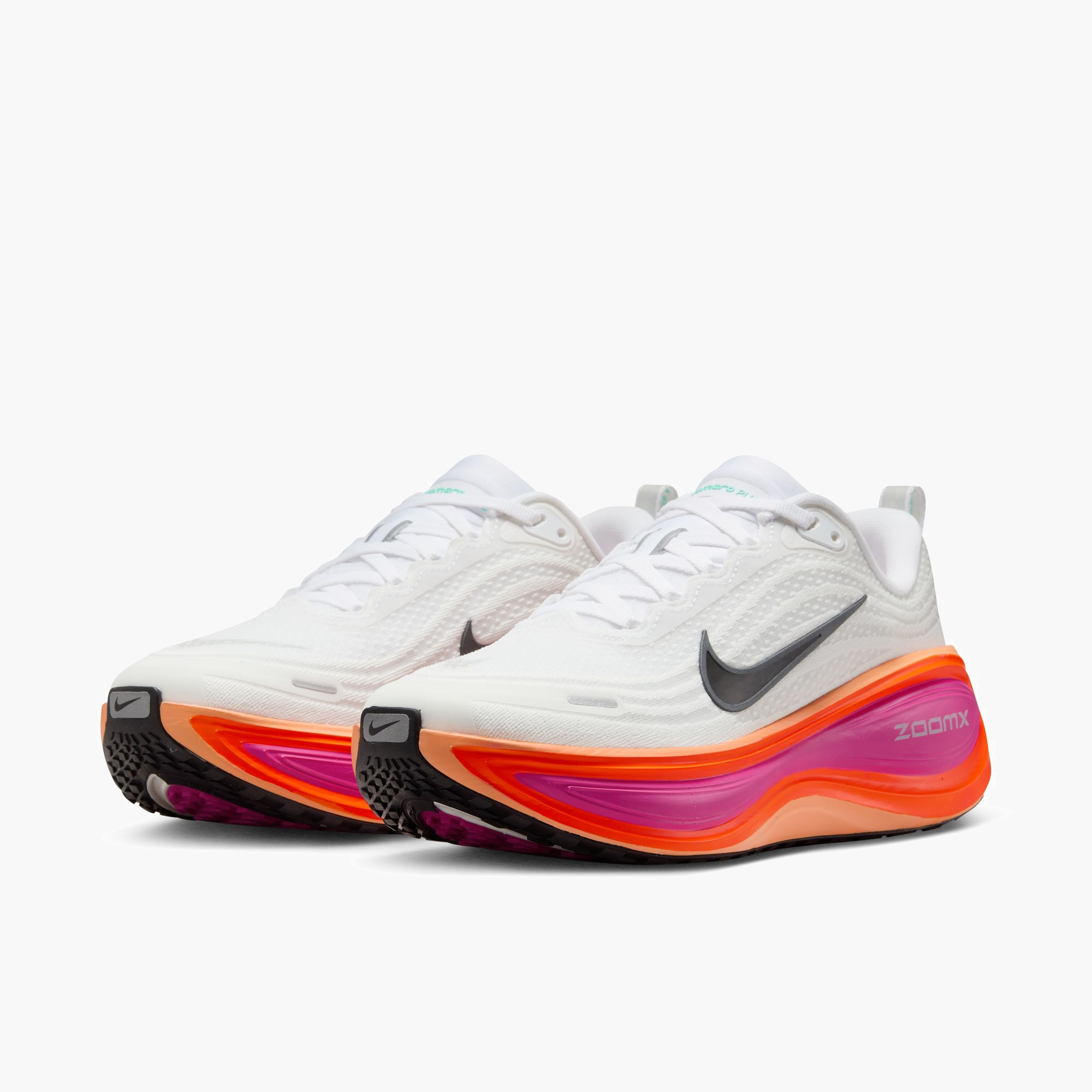 3/4 angle shot of Women's Vomero Plus in White / Black-Fire Pink-Hyper Crimson