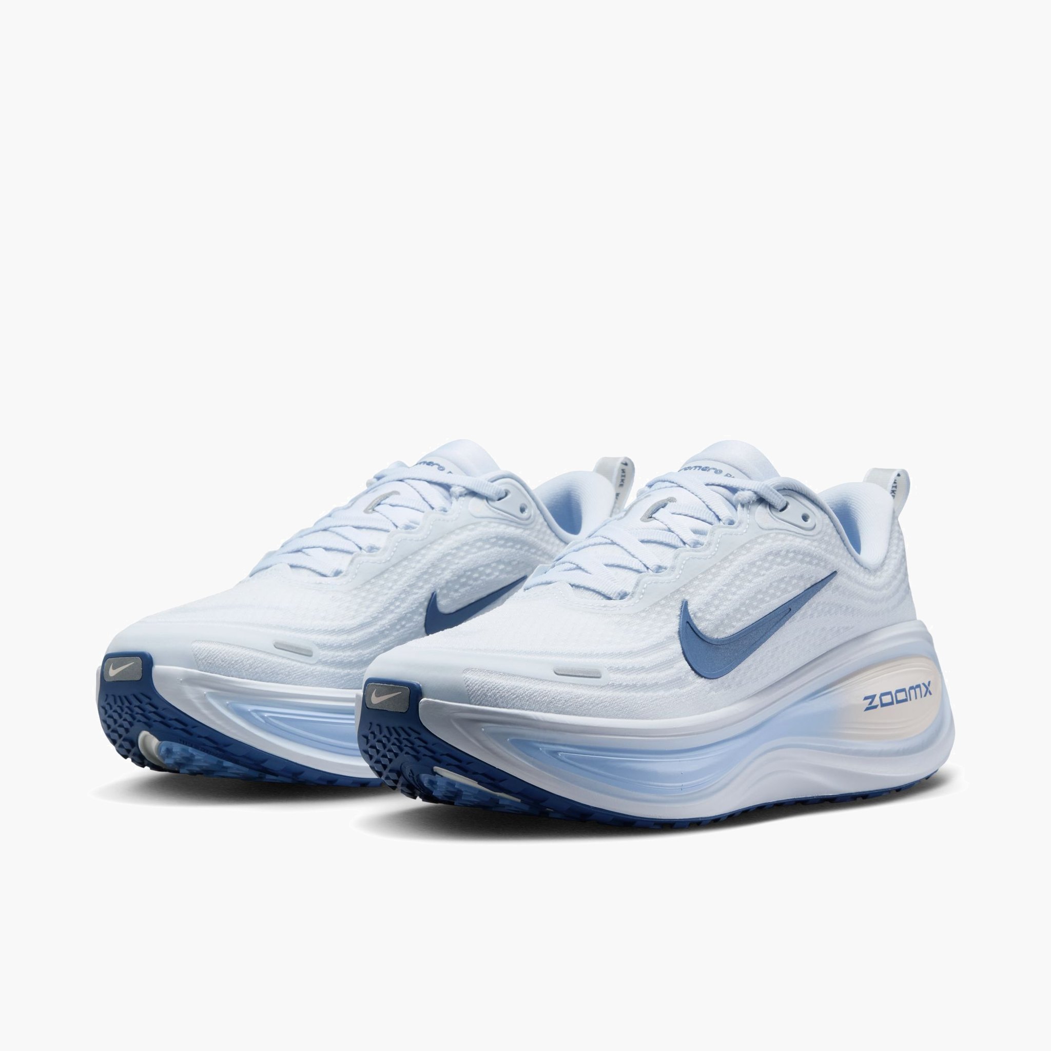 3/4 angle shot of Women's Vomero Plus in White / Mystic Navy-Aluminum-Football Grey