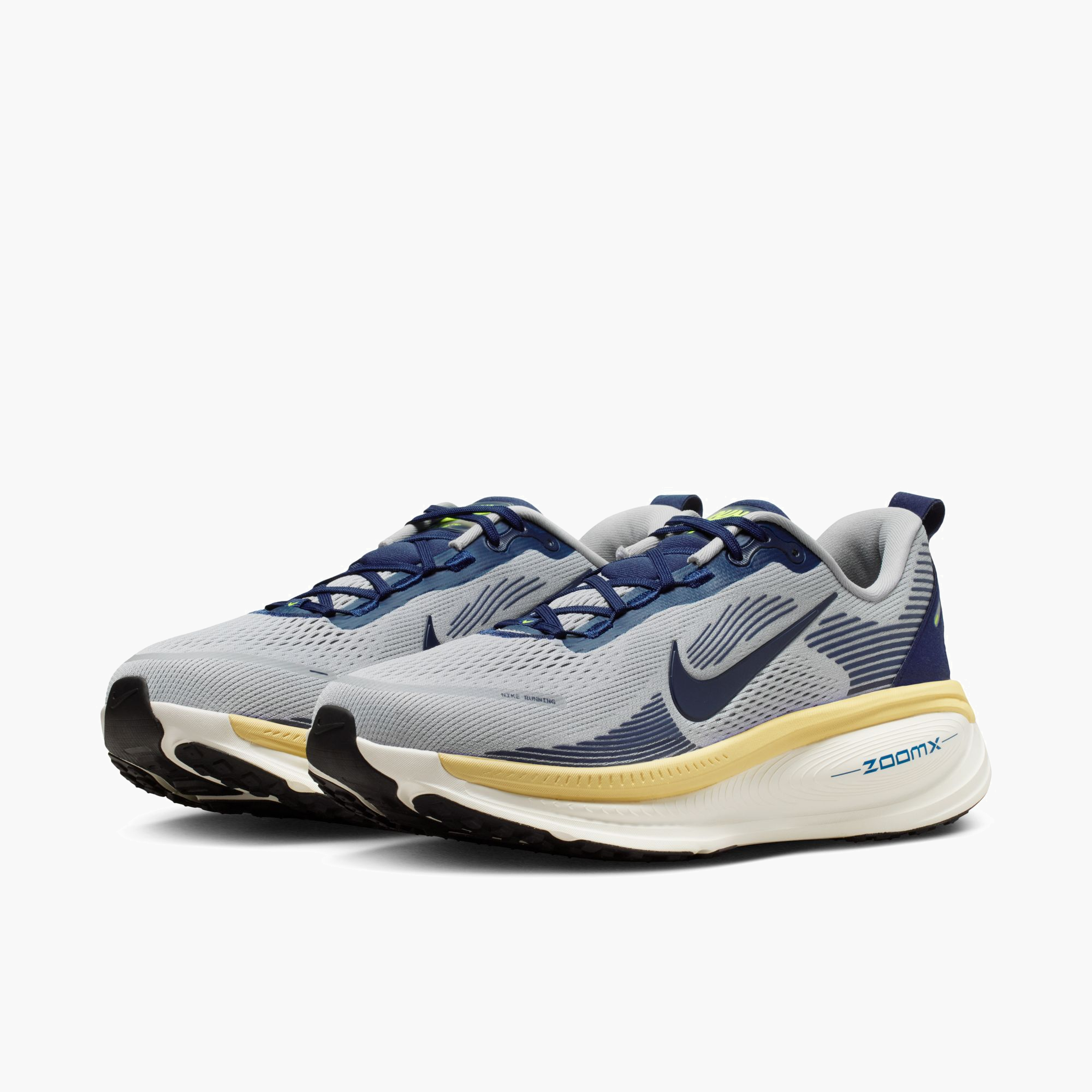 3/4 angle shot of Men's Vomero 18 in Wolf Grey / Midnight Navy-Pewter-Sail