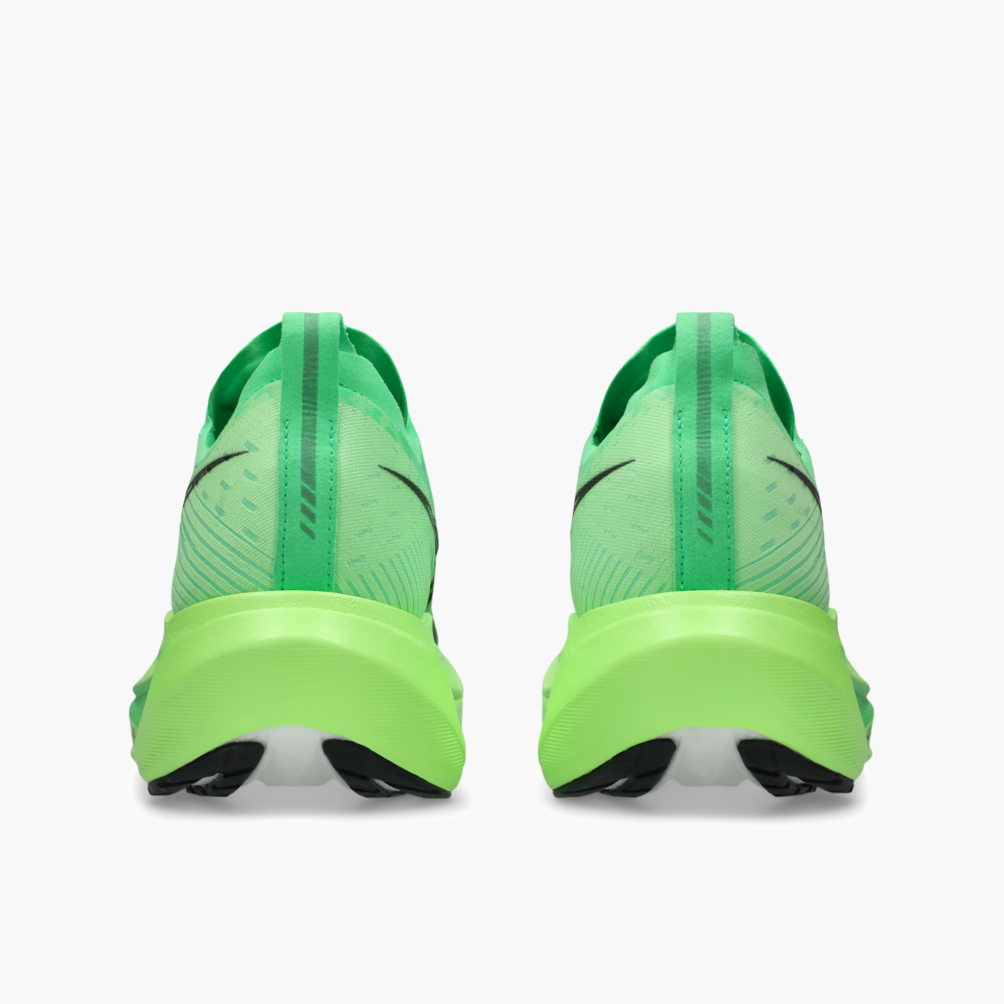 Heel angle shot of All Gender Megablast in Vital Green / Black