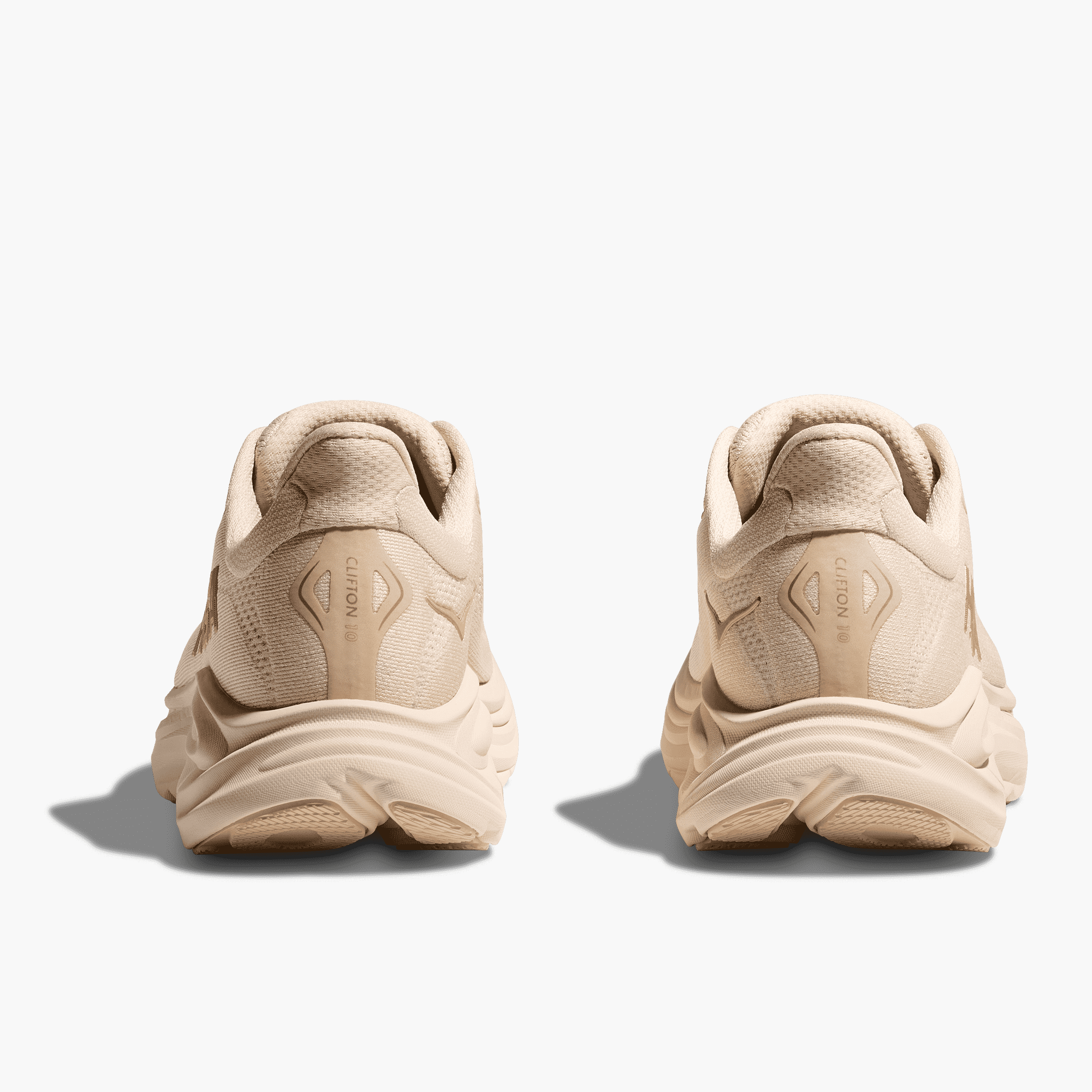 Heel angle shot of Women's Clifton 10 in Vanilla / Birch